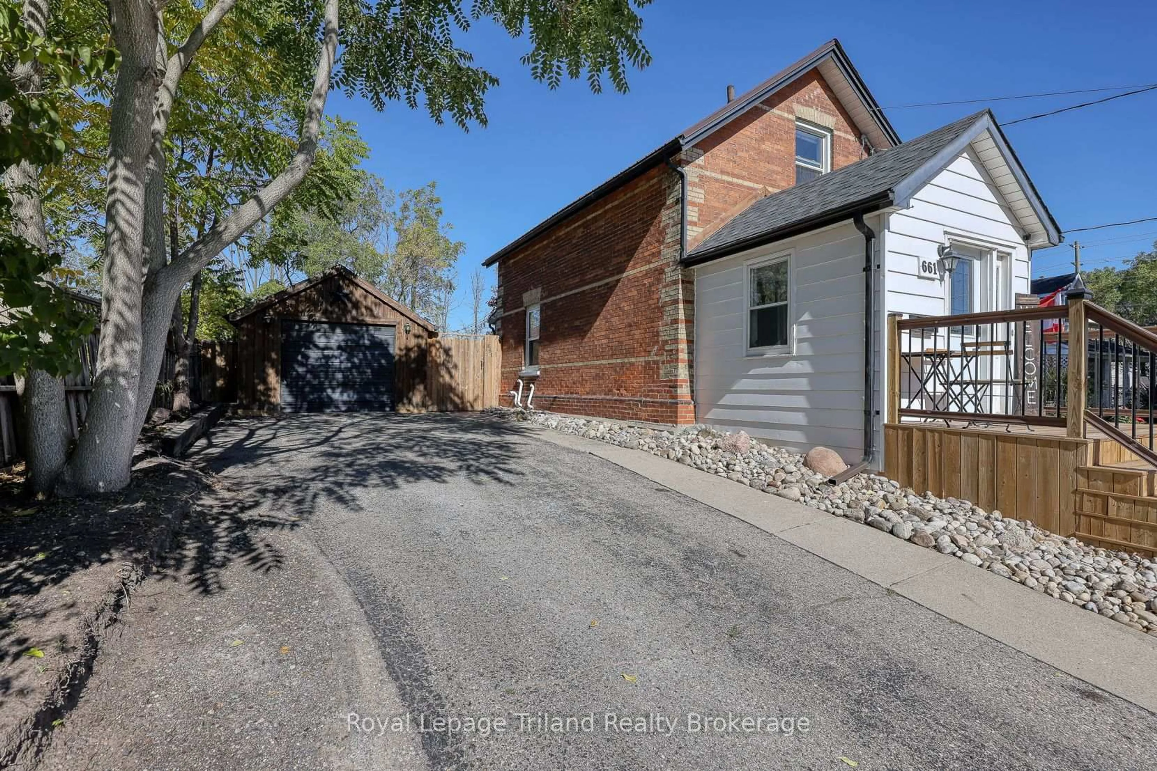 Home with brick exterior material, street for 661 Henry St, Woodstock Ontario N4S 1X8