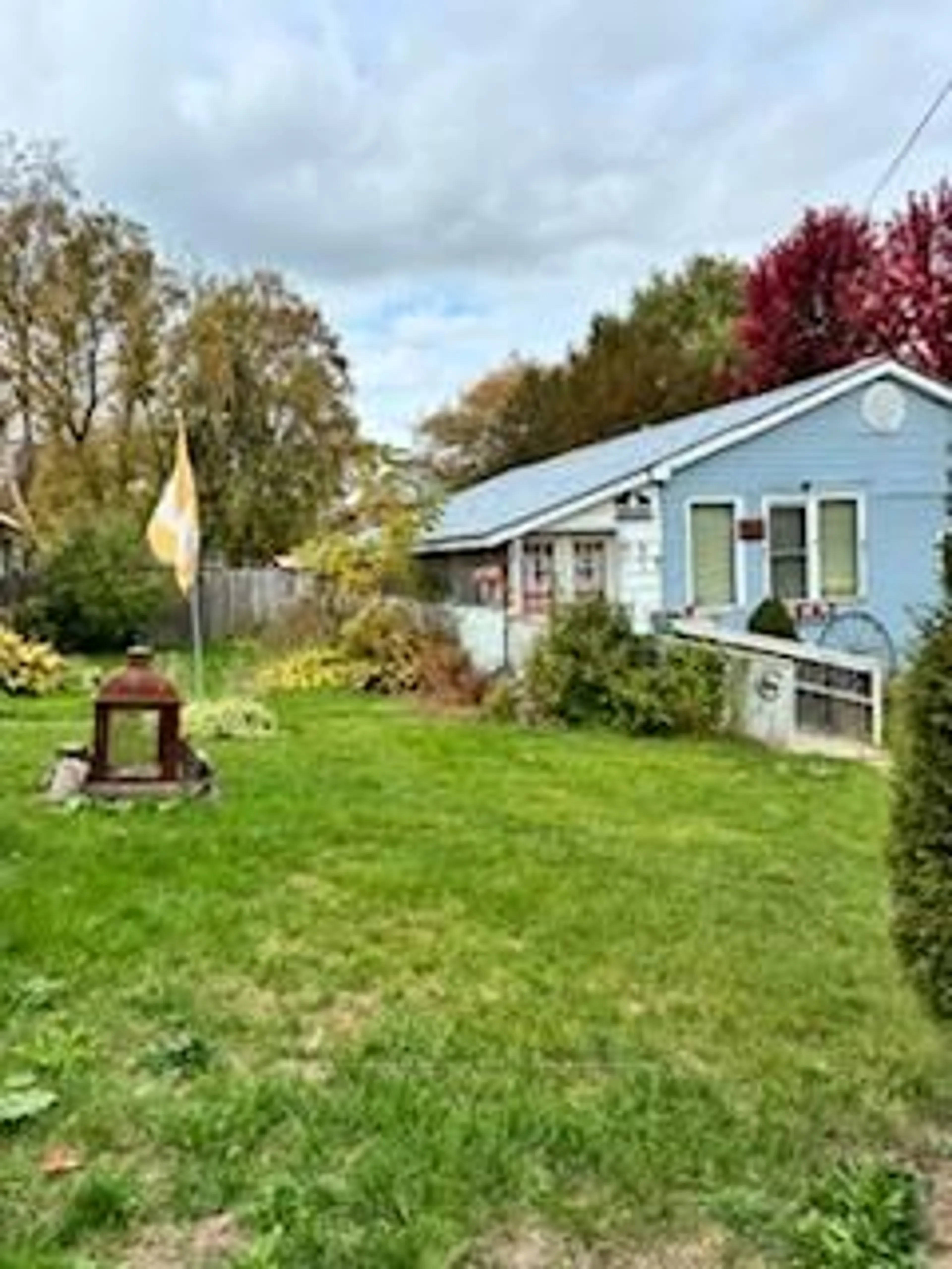 A pic from outside/outdoor area/front of a property/back of a property/a pic from drone, street for 13 Erieus St, Bayham Ontario N0L 1T0