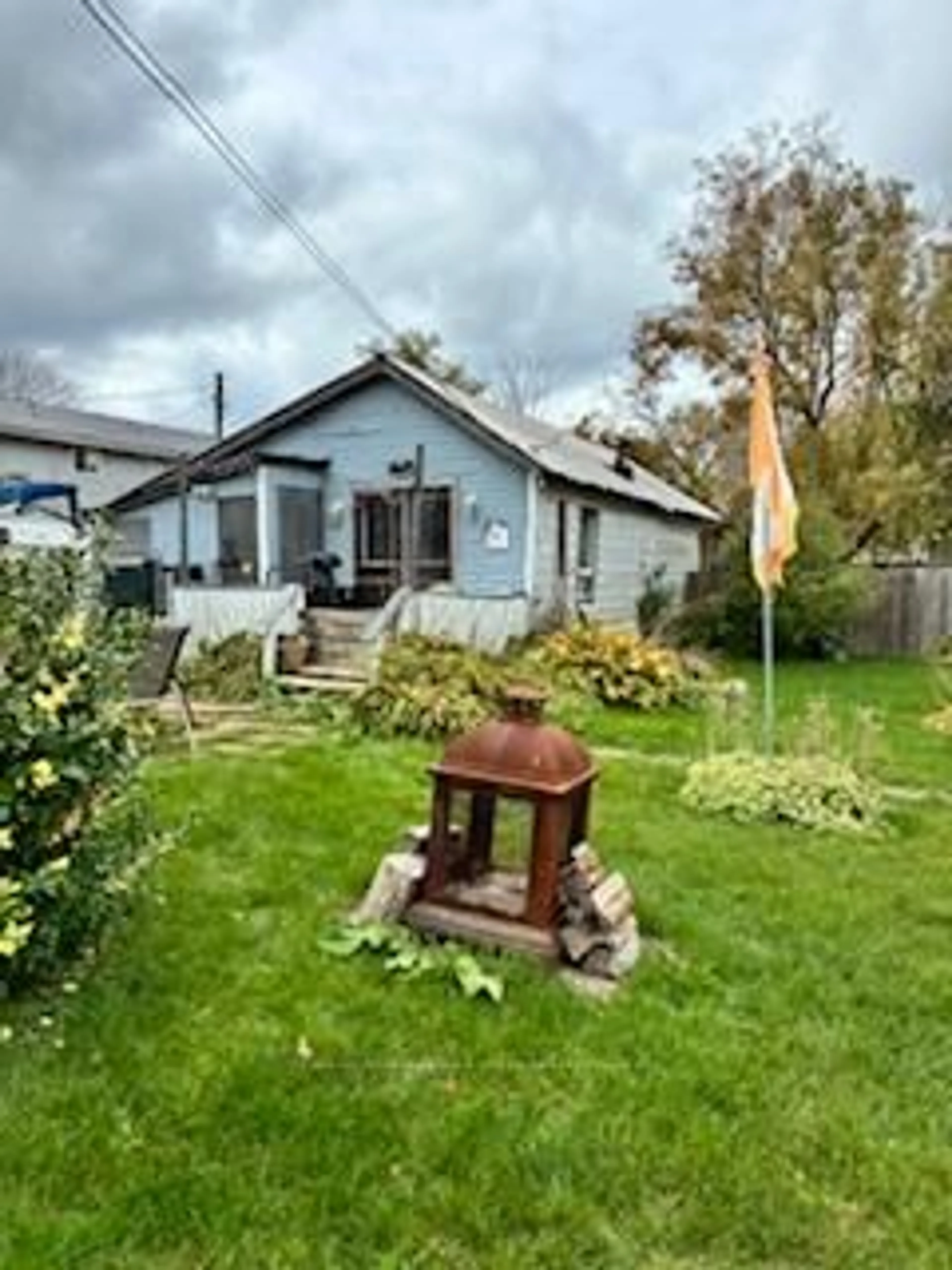 A pic from outside/outdoor area/front of a property/back of a property/a pic from drone, street for 13 Erieus St, Bayham Ontario N0L 1T0
