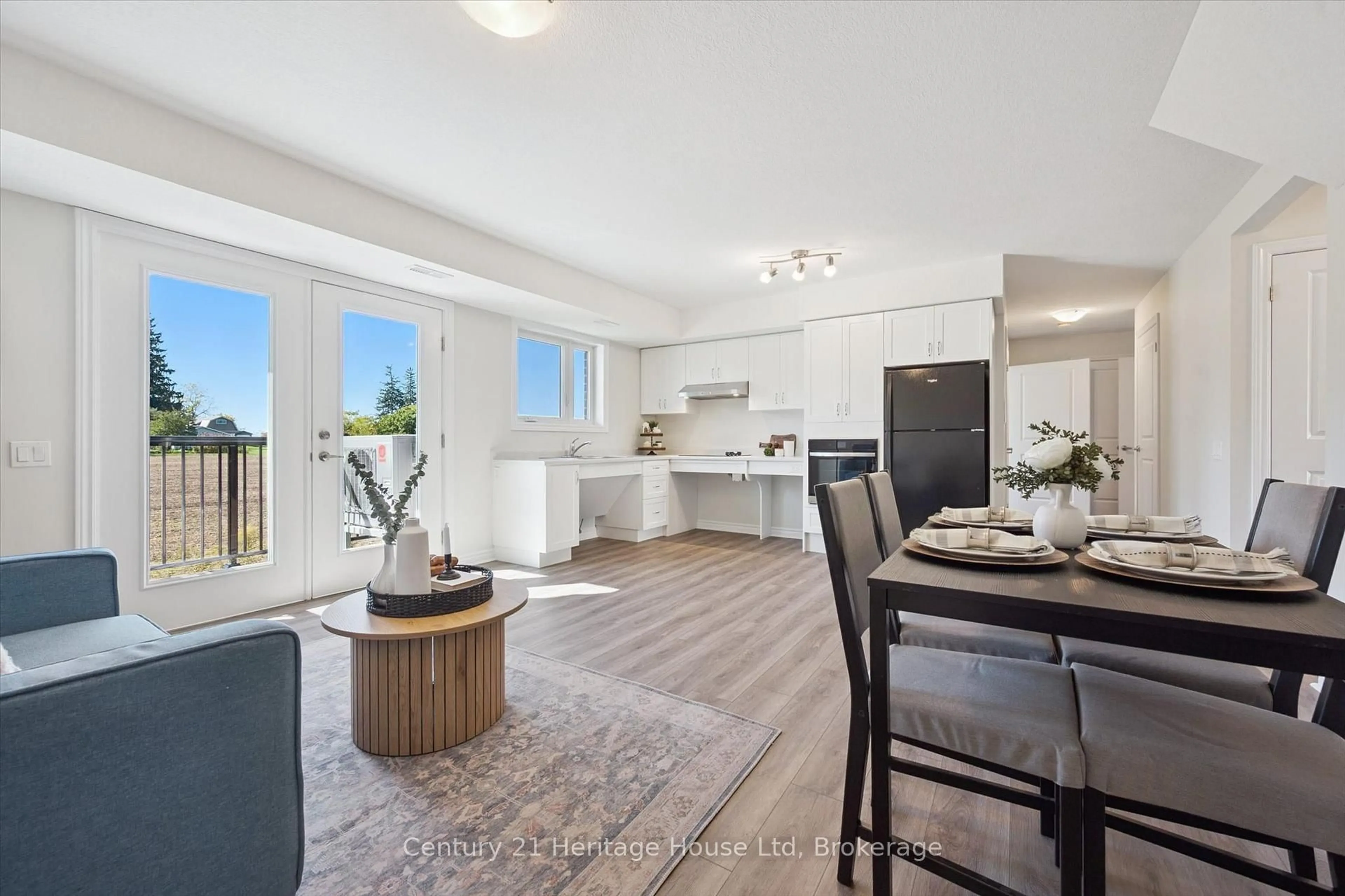 Open concept kitchen, wood/laminate floor for 465 Garafraxa St #5, Centre Wellington Ontario N1M 0L6