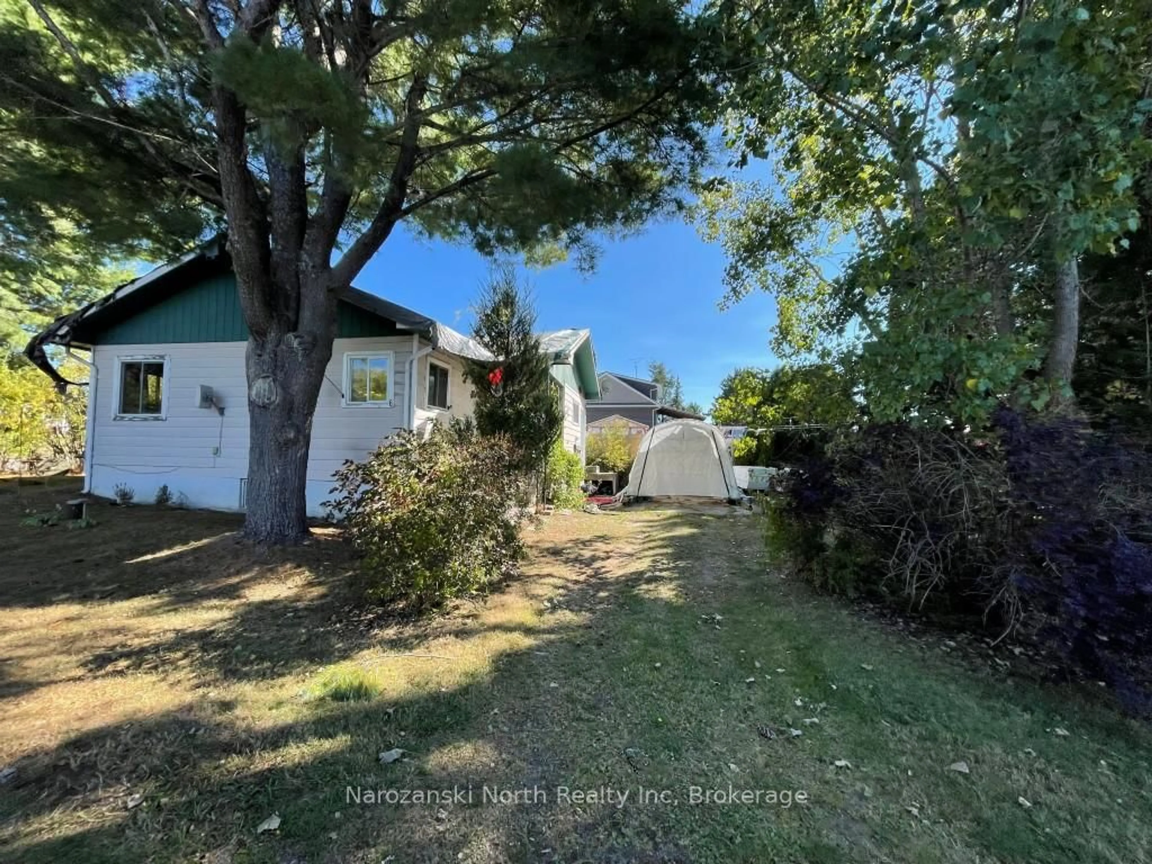 A pic from outside/outdoor area/front of a property/back of a property/a pic from drone, street for 6 Champlain St, French River Ontario P0M 2N0