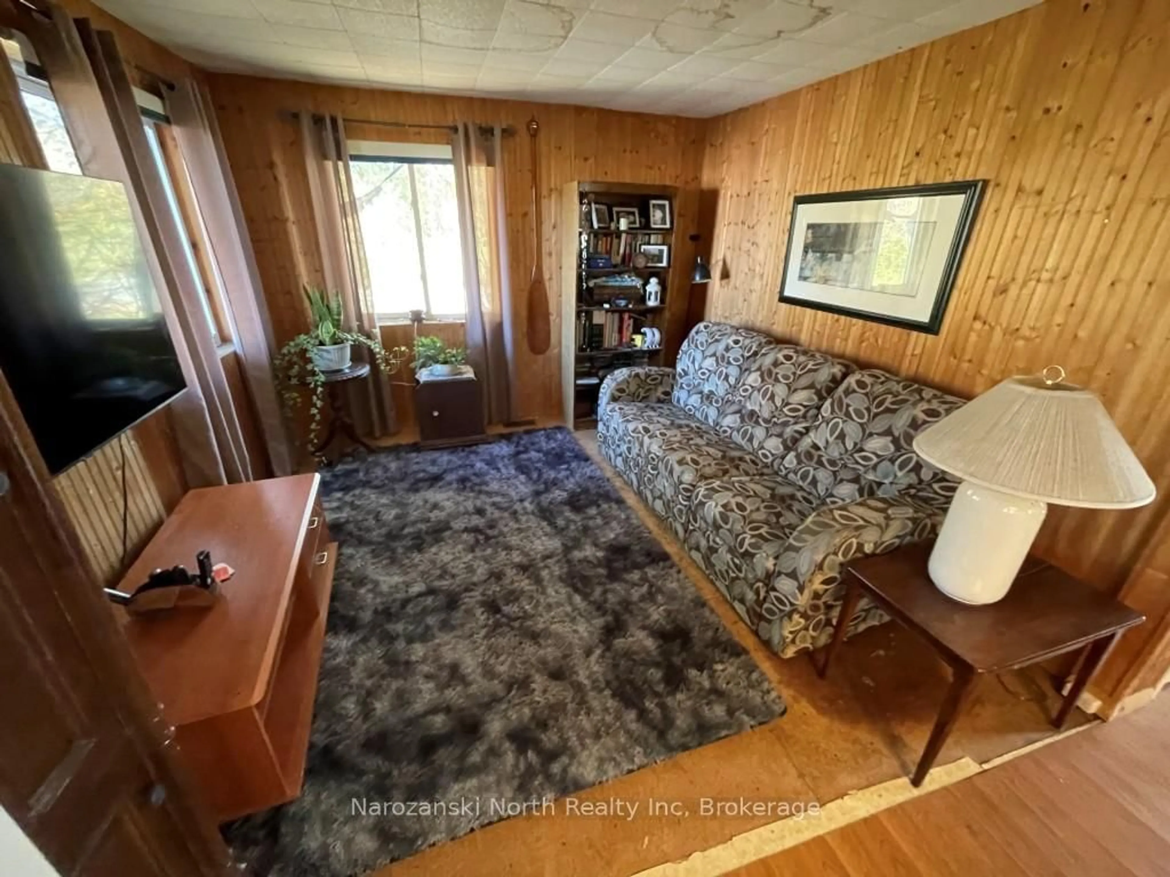 Living room with furniture, wood/laminate floor for 6 Champlain St, French River Ontario P0M 2N0