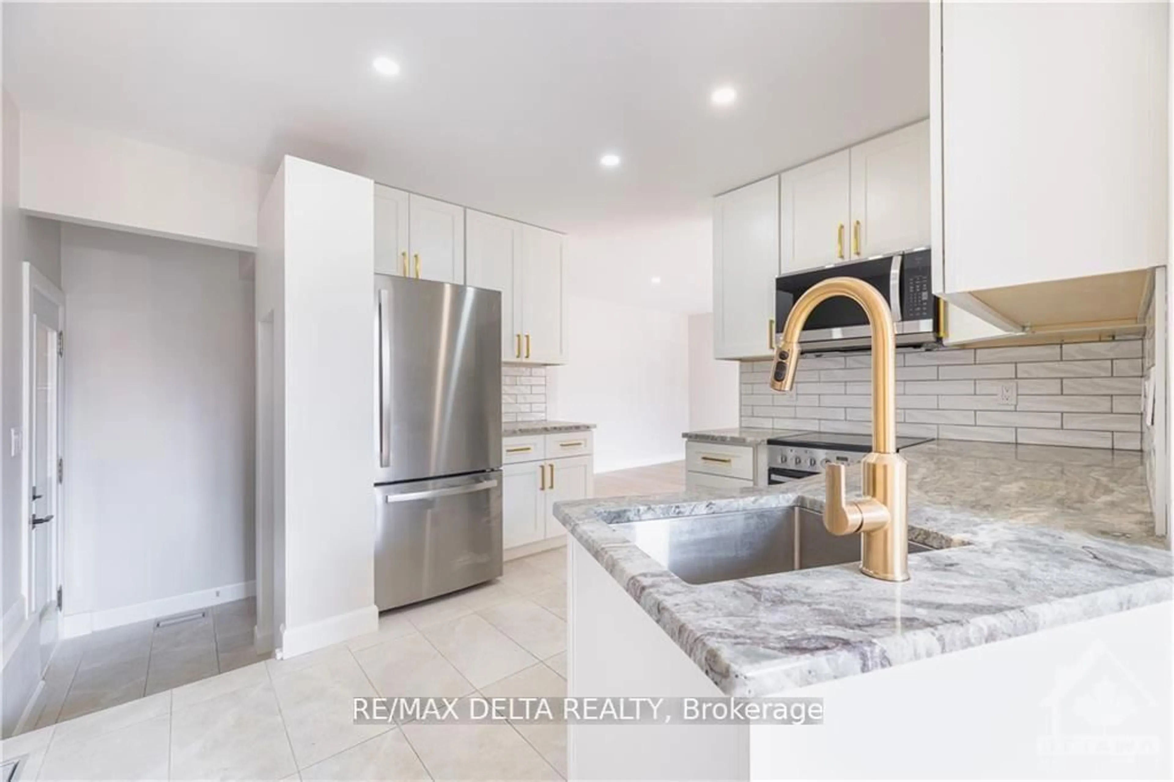 Open concept kitchen, ceramic/tile floor for 2351 Jefferson St, Ottawa Ontario K1H 6Z9