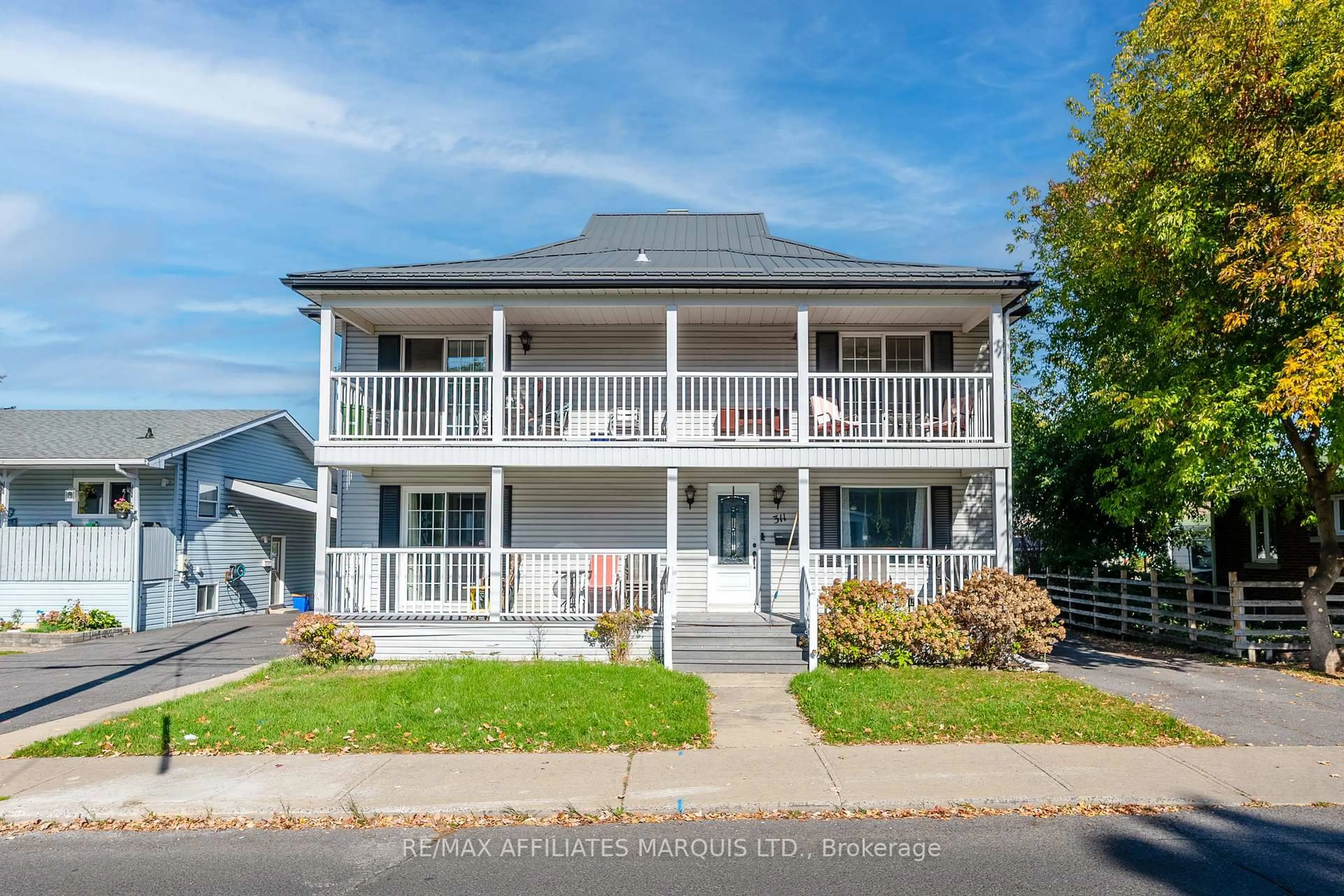 Home with vinyl exterior material, street for 311 Sixth St, Cornwall Ontario K6H 2N8