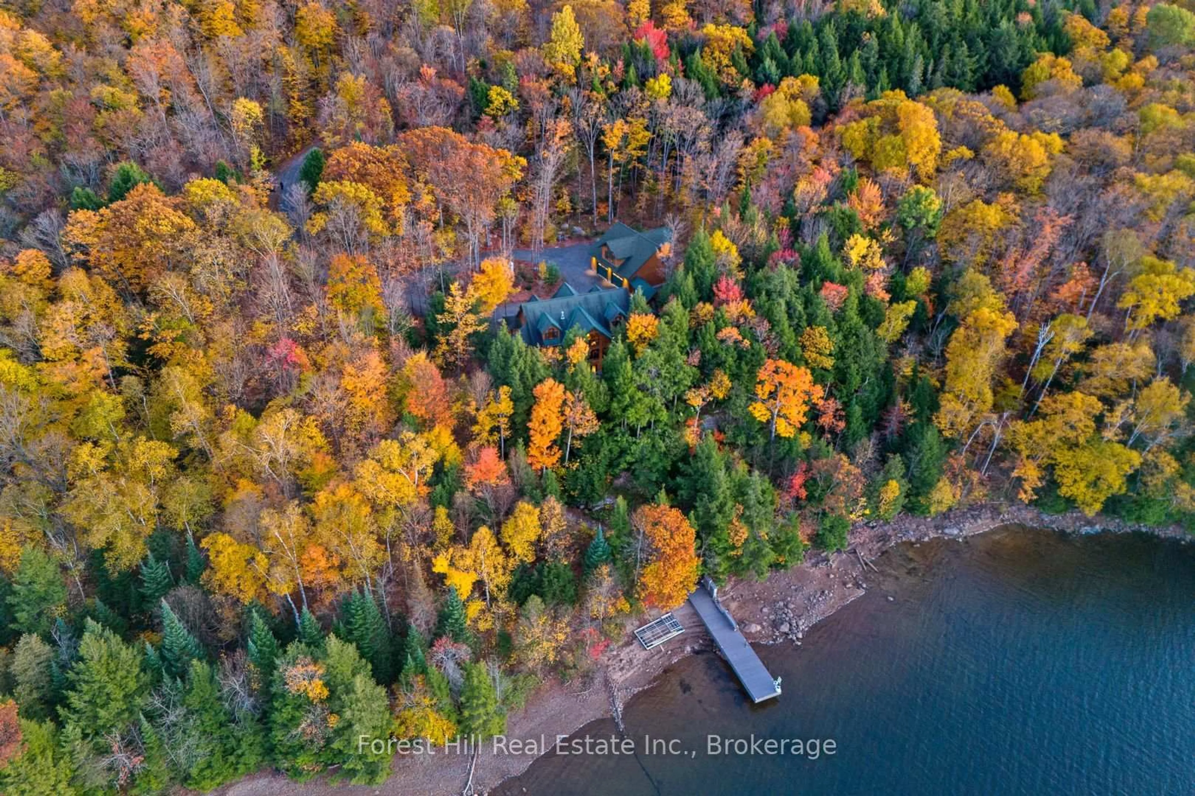A pic from outside/outdoor area/front of a property/back of a property/a pic from drone, water/lake/river/ocean view for 5017 Kawagama Lake Rd, Dysart et al Ontario P0A 1E0