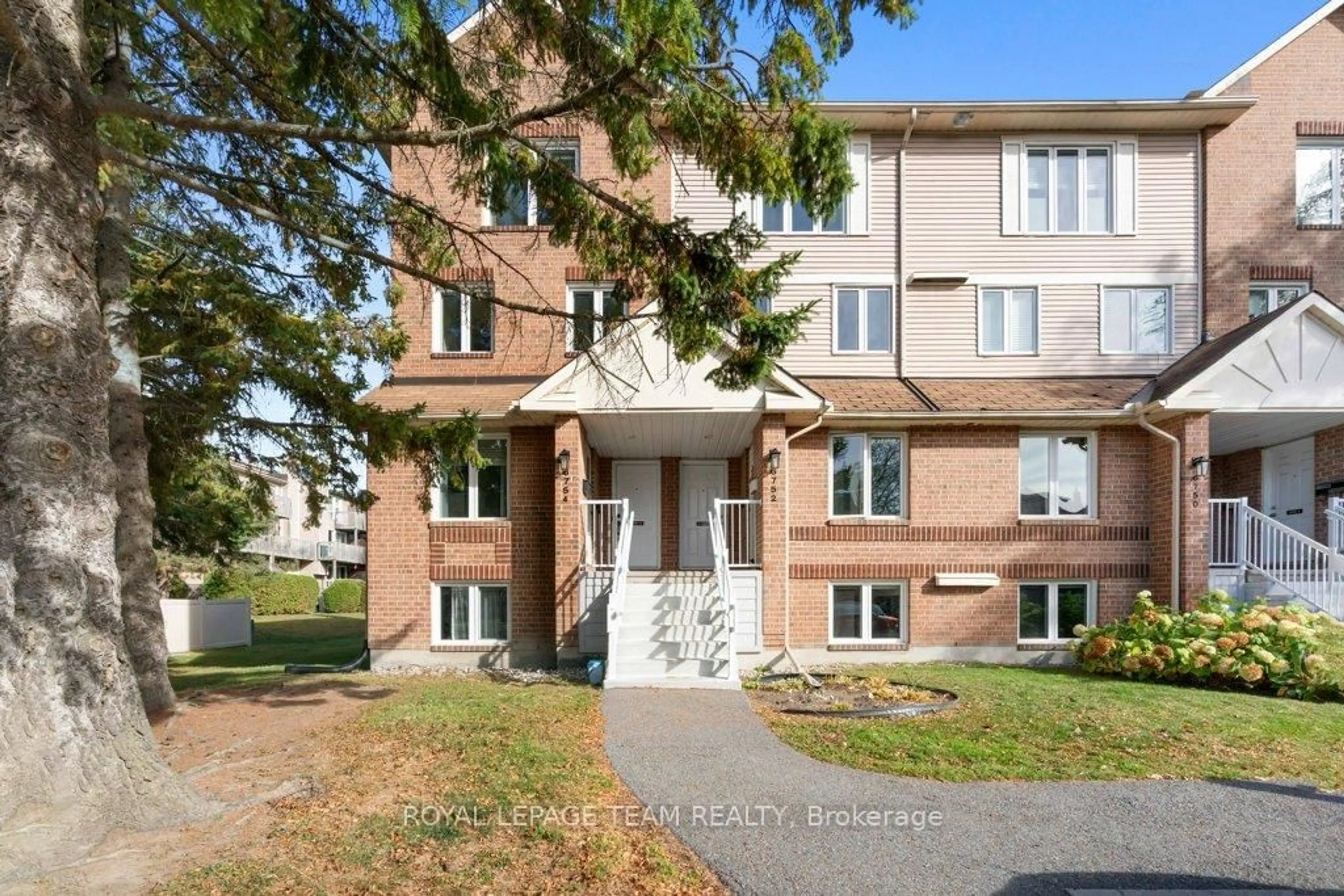 Home with brick exterior material, building for 6754 Jeanne D'Arc Blvd #B, Ottawa Ontario K1C 6E9