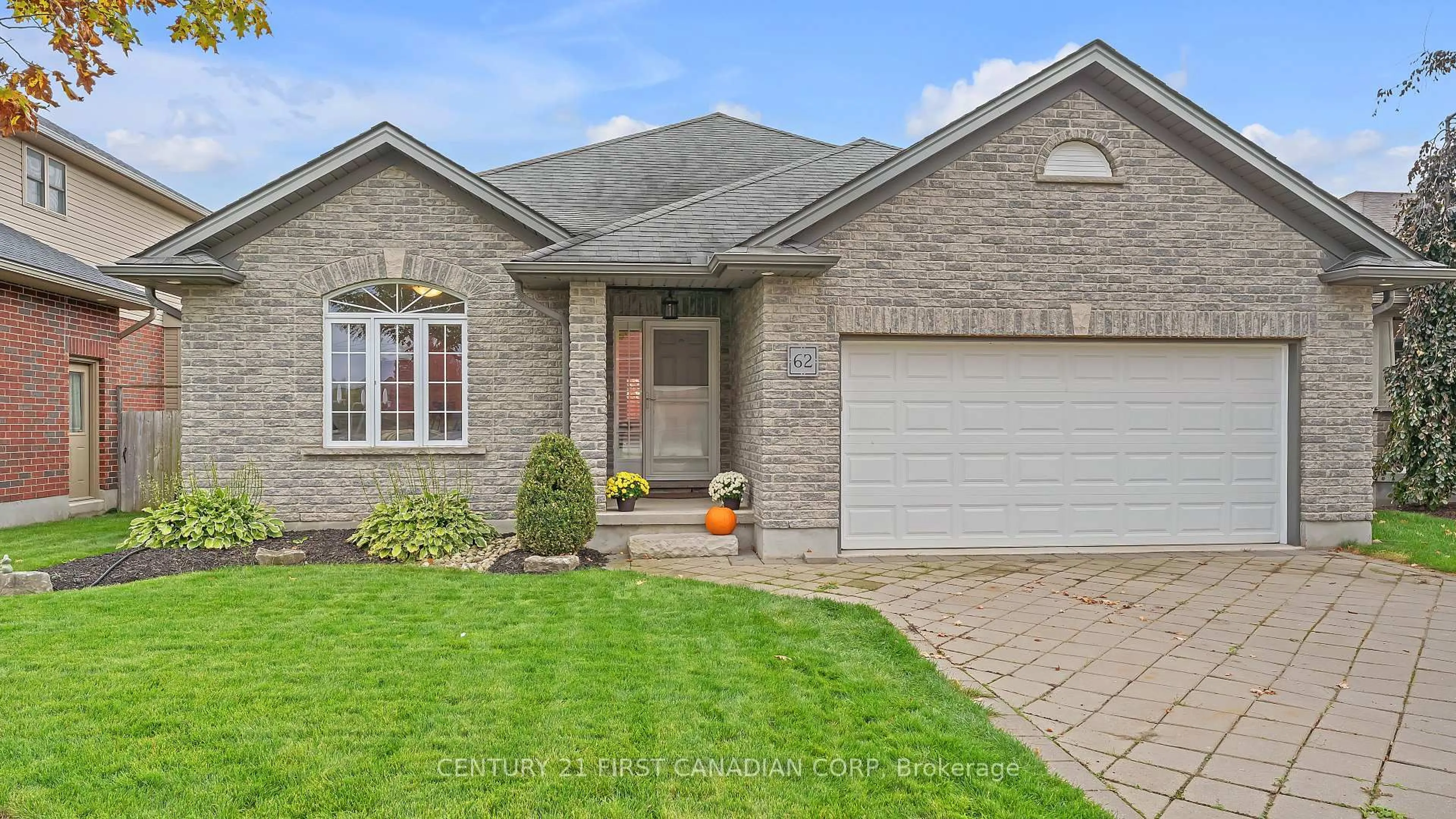 Home with brick exterior material, street for 62 Elliott Tr, Thames Centre Ontario N0M 2P0