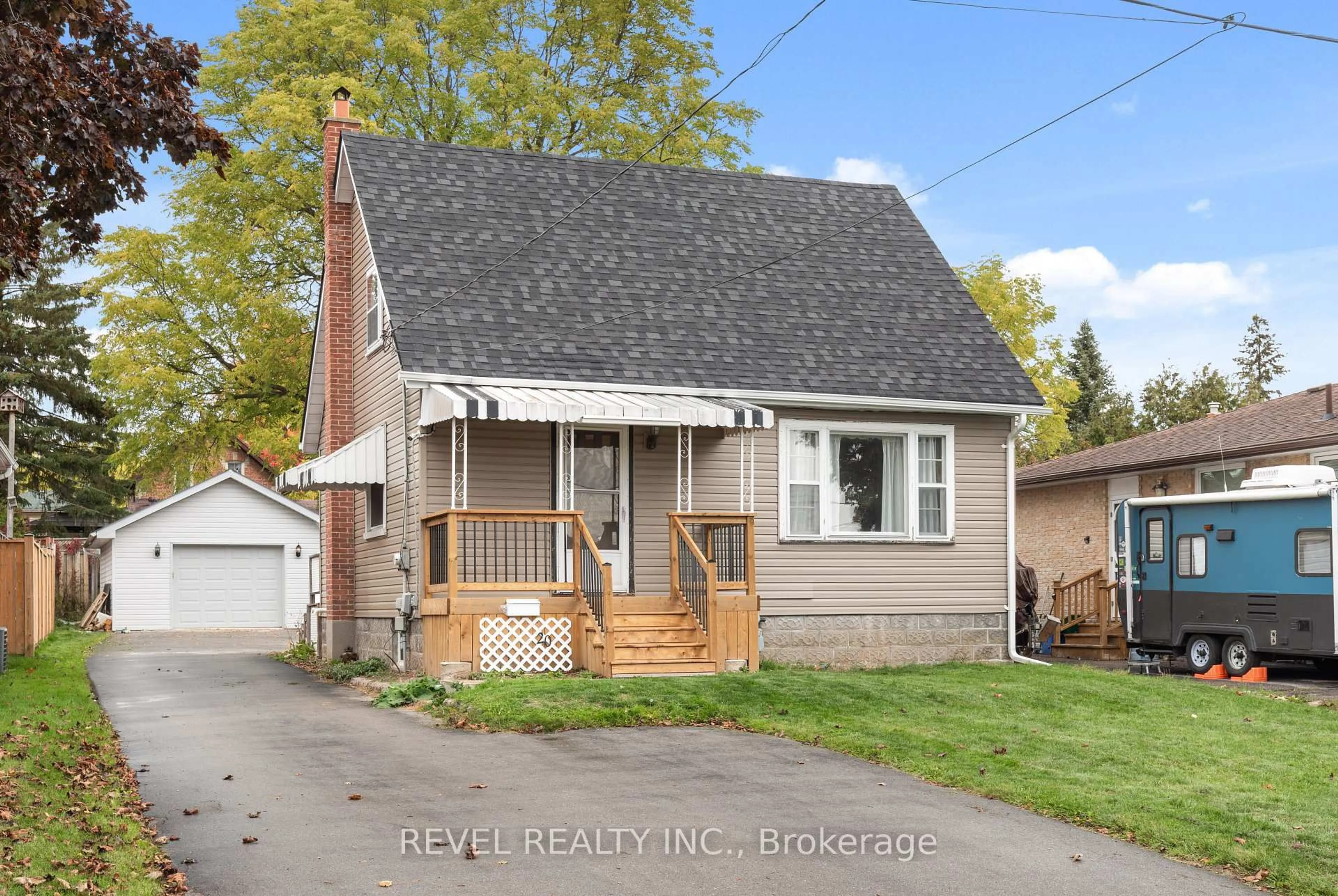 Home with vinyl exterior material, street for 20 Division St, Kawartha Lakes Ontario K9V 4S1