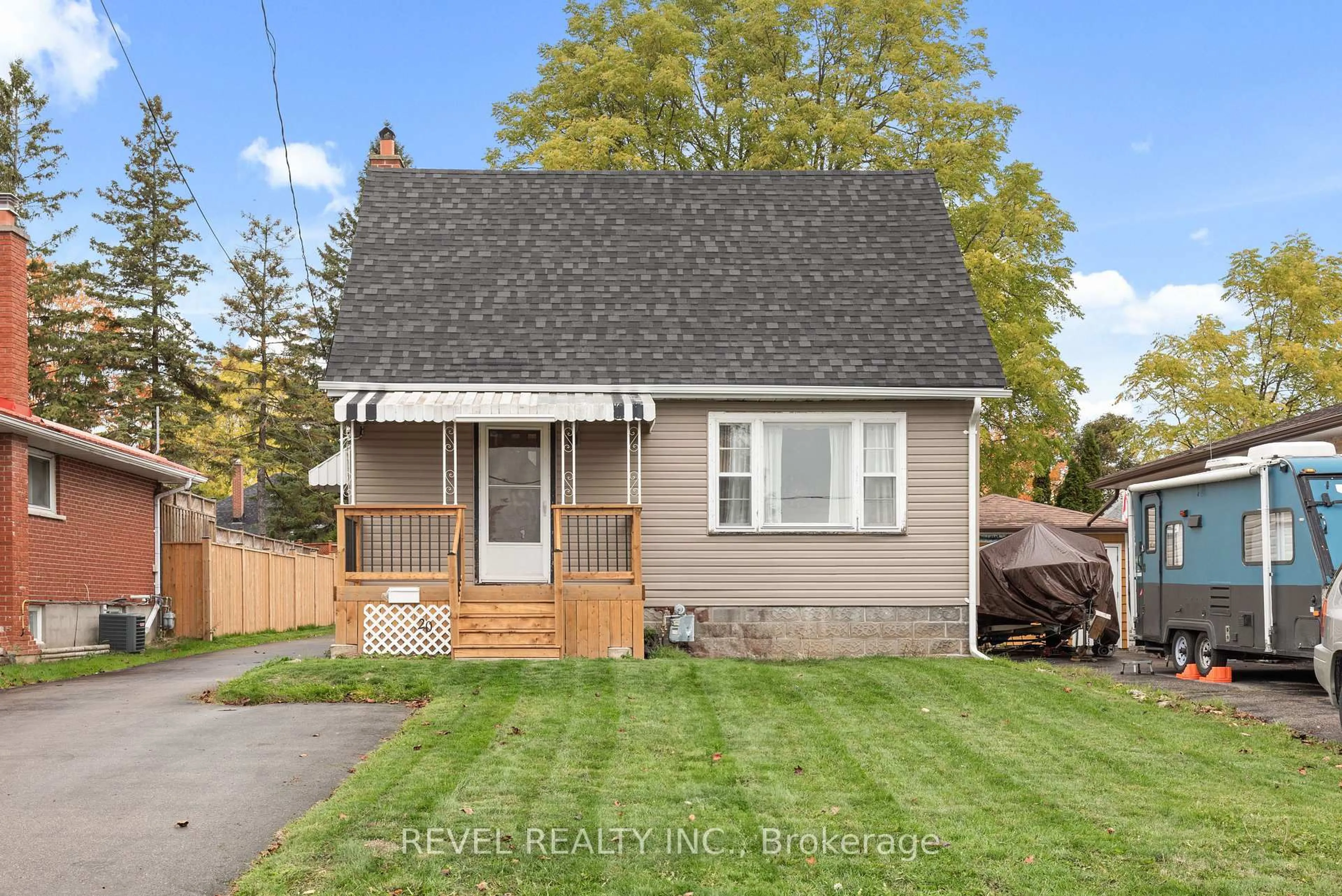 Home with vinyl exterior material, street for 20 Division St, Kawartha Lakes Ontario K9V 4S1