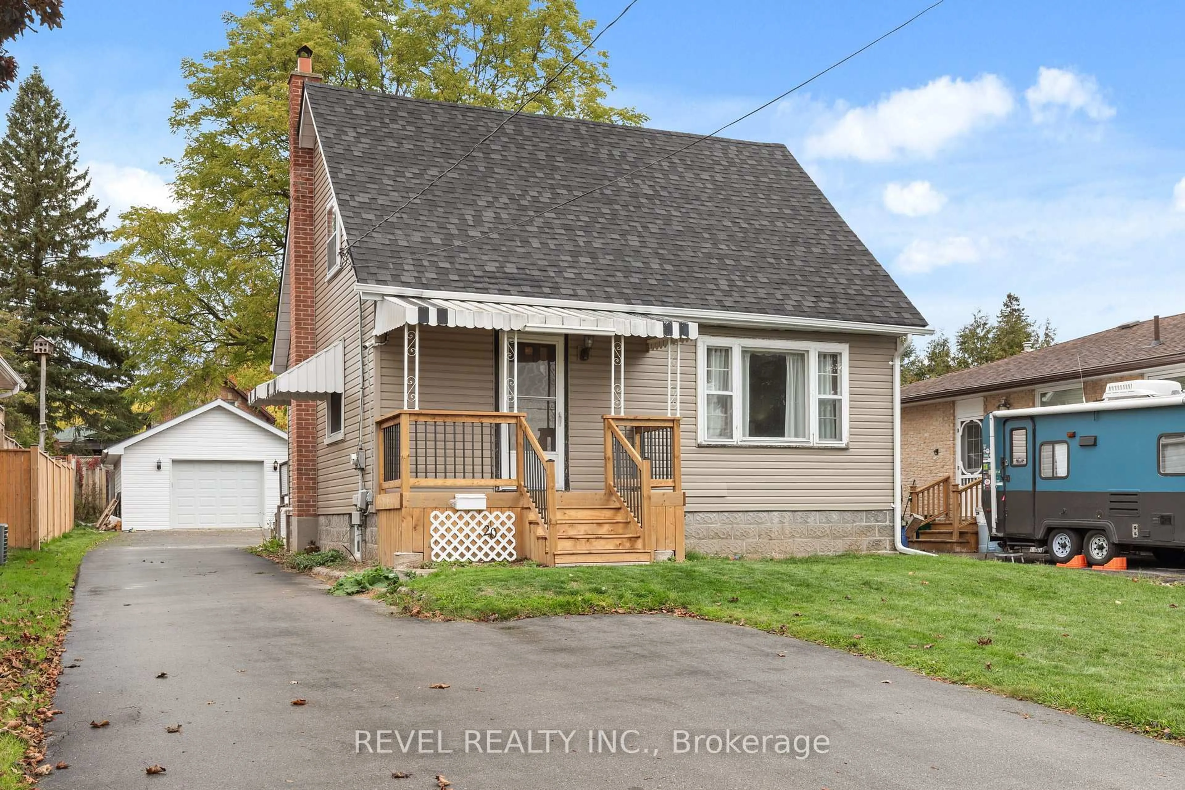 Home with vinyl exterior material, street for 20 Division St, Kawartha Lakes Ontario K9V 4S1