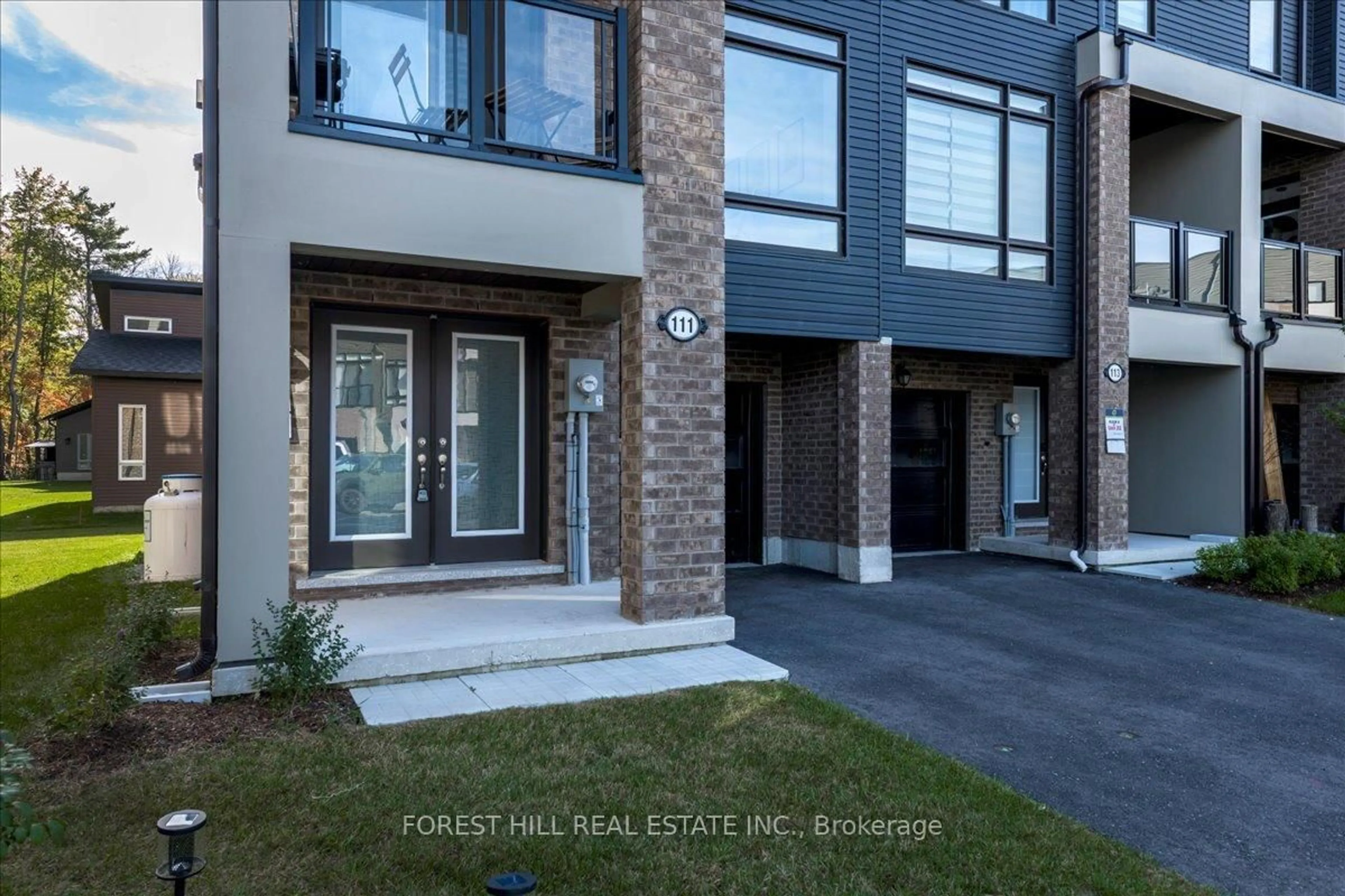 Home with brick exterior material, street for 111 Marina Village Dr, Georgian Bay Ontario L0K 1S0