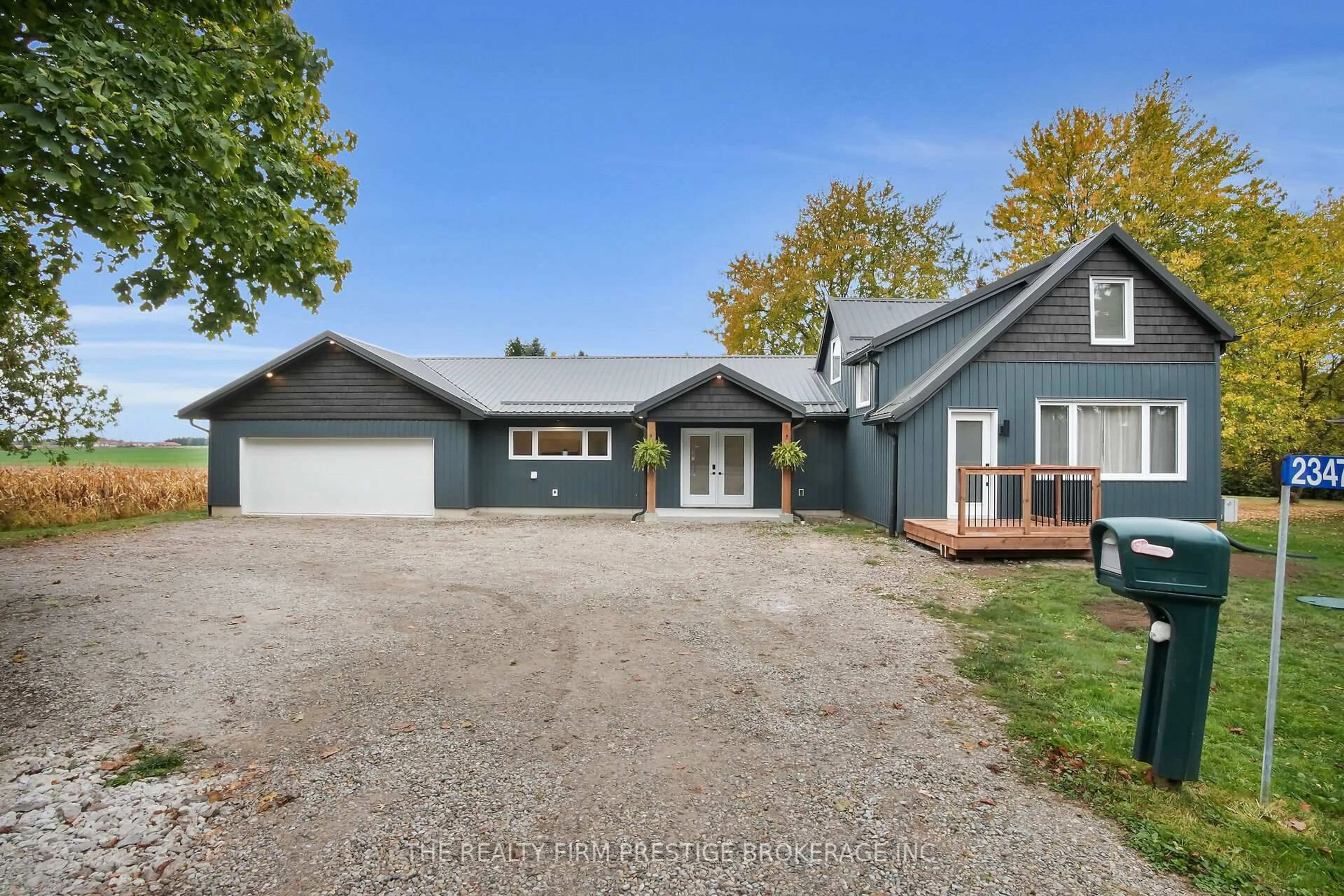 A pic from outside/outdoor area/front of a property/back of a property/a pic from drone, street for 23473 Wonderland Rd, Middlesex Centre Ontario N0M 1P0