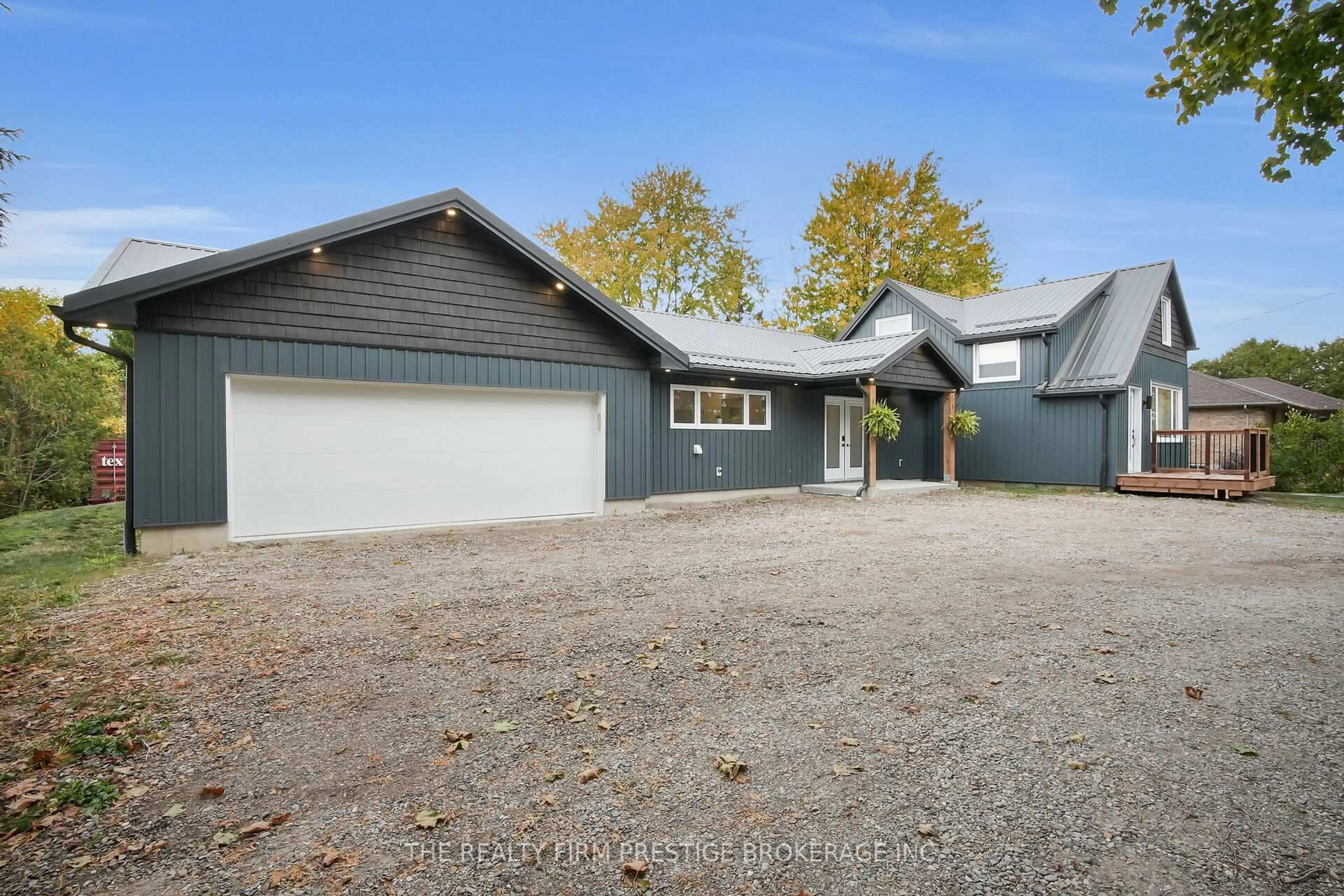 A pic from outside/outdoor area/front of a property/back of a property/a pic from drone, street for 23473 Wonderland Rd, Middlesex Centre Ontario N0M 1P0