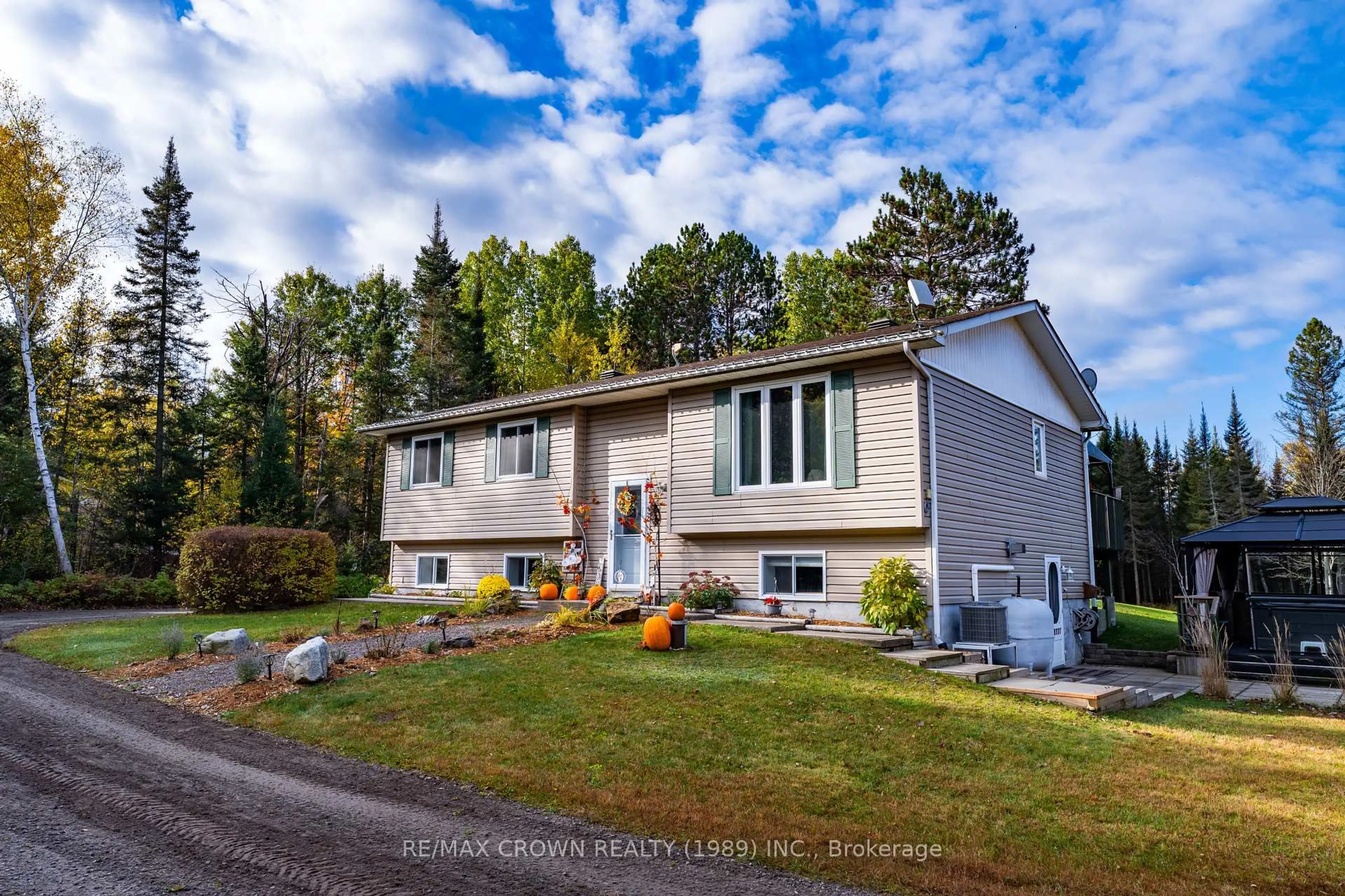 Home with vinyl exterior material, street for 65 Byers Rd, Callander Ontario P0H 1H0