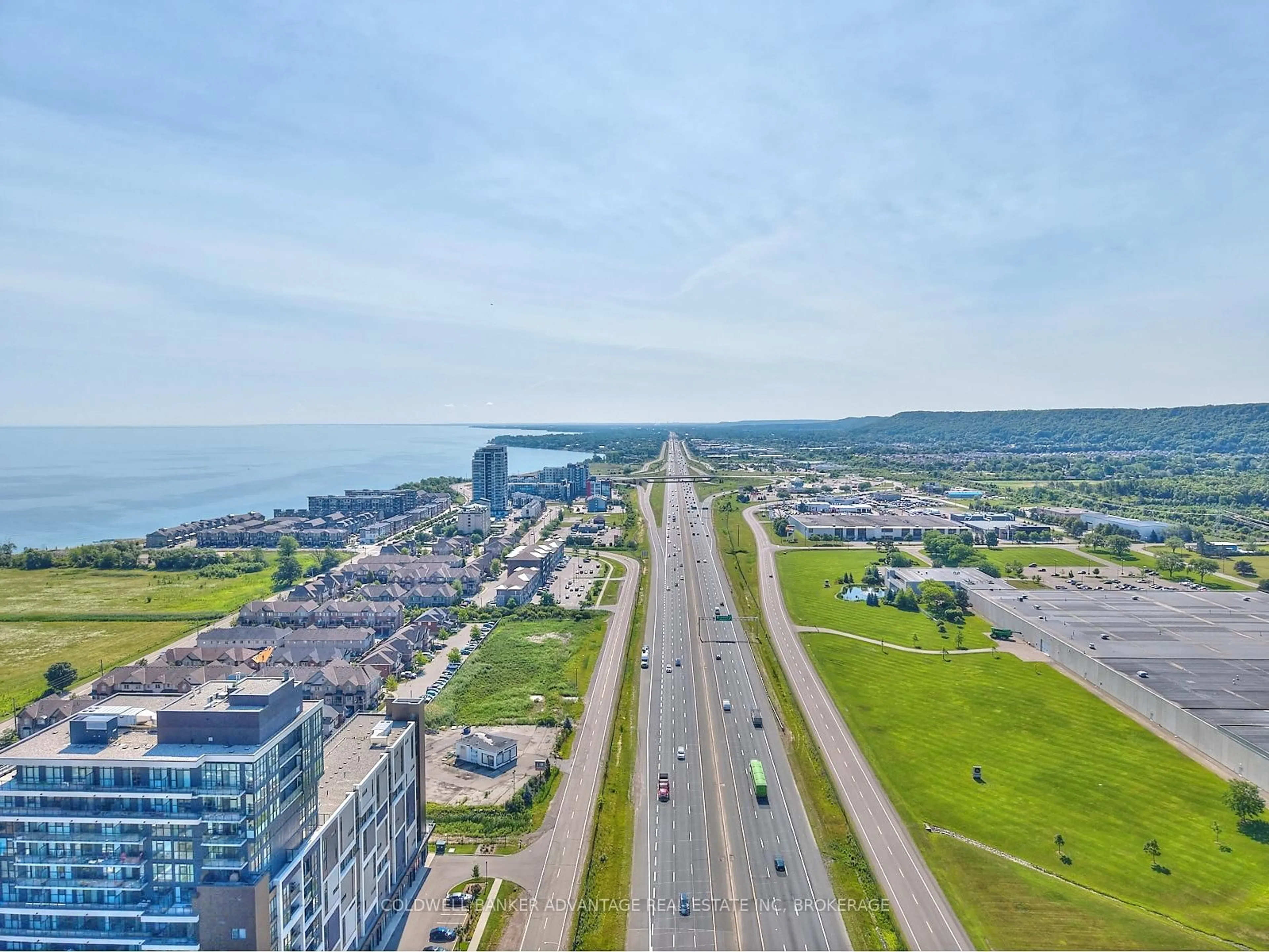 A pic from outside/outdoor area/front of a property/back of a property/a pic from drone, water/lake/river/ocean view for 550 North Service Rd #610, Grimsby Ontario L3M 0H9
