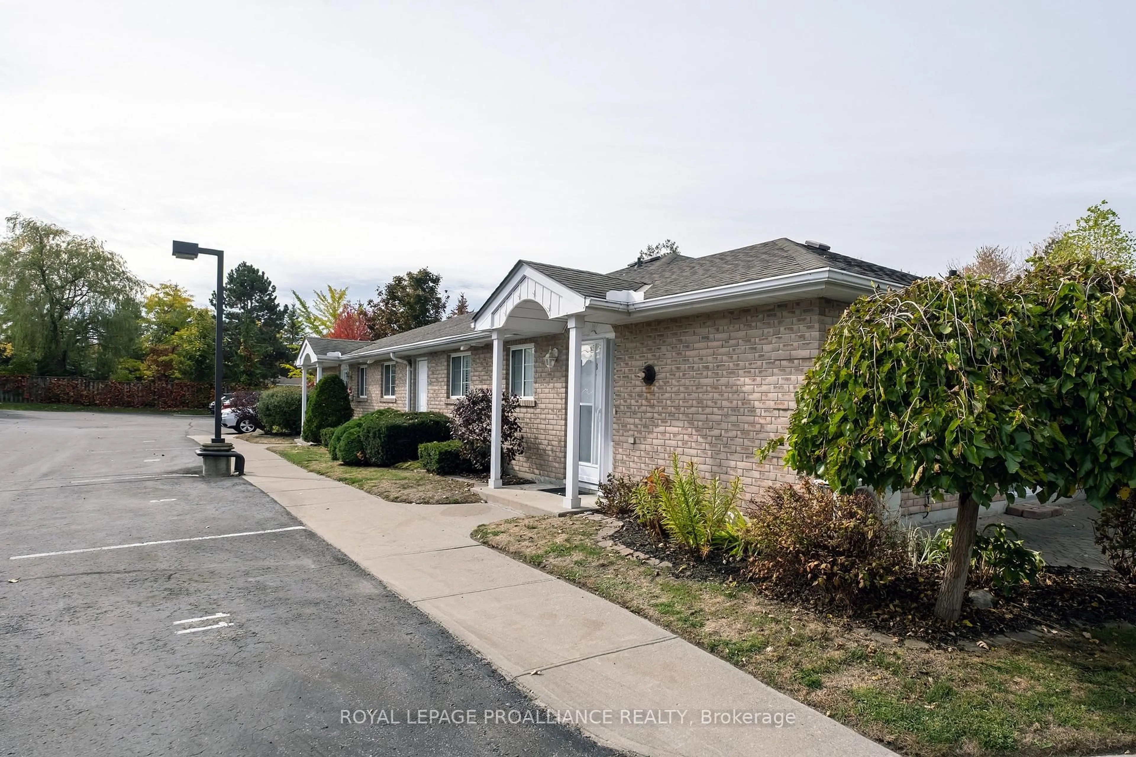 A pic from outside/outdoor area/front of a property/back of a property/a pic from drone, street for 351 Cannifton Rd #8, Belleville Ontario K8N 4Z6