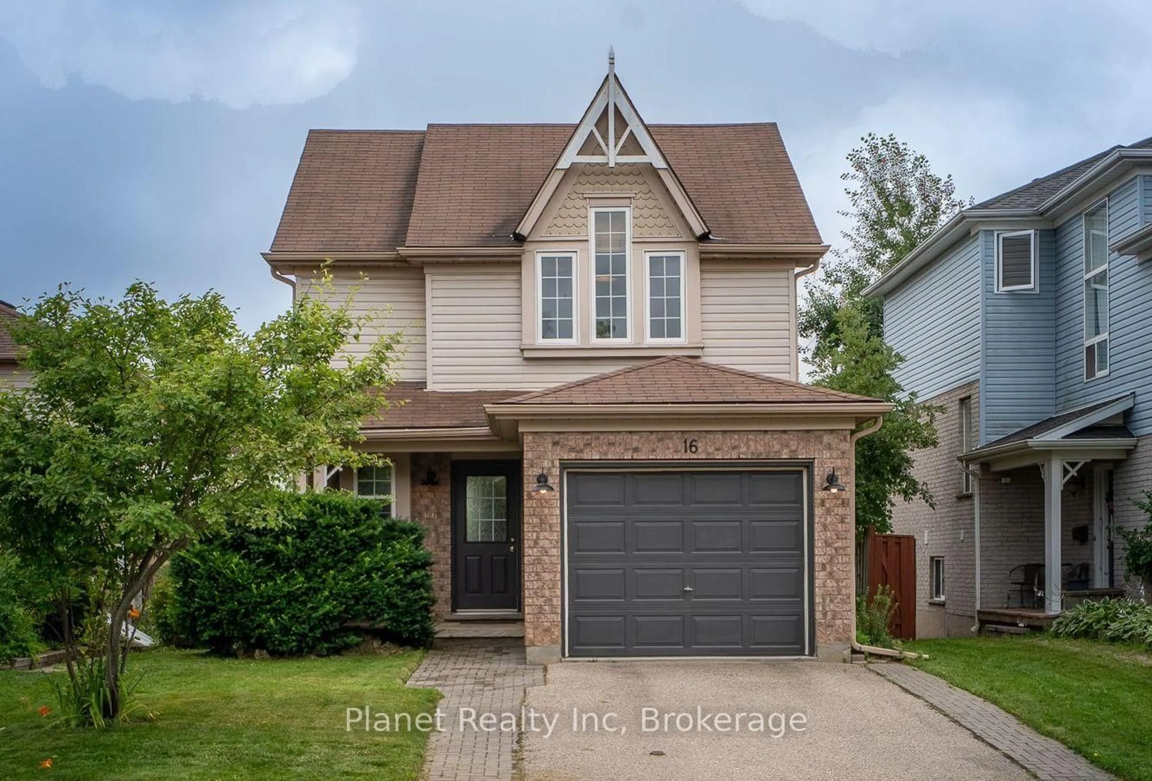 Home with brick exterior material, street for 16 Southcreek Tr, Guelph Ontario N1G 4Y8