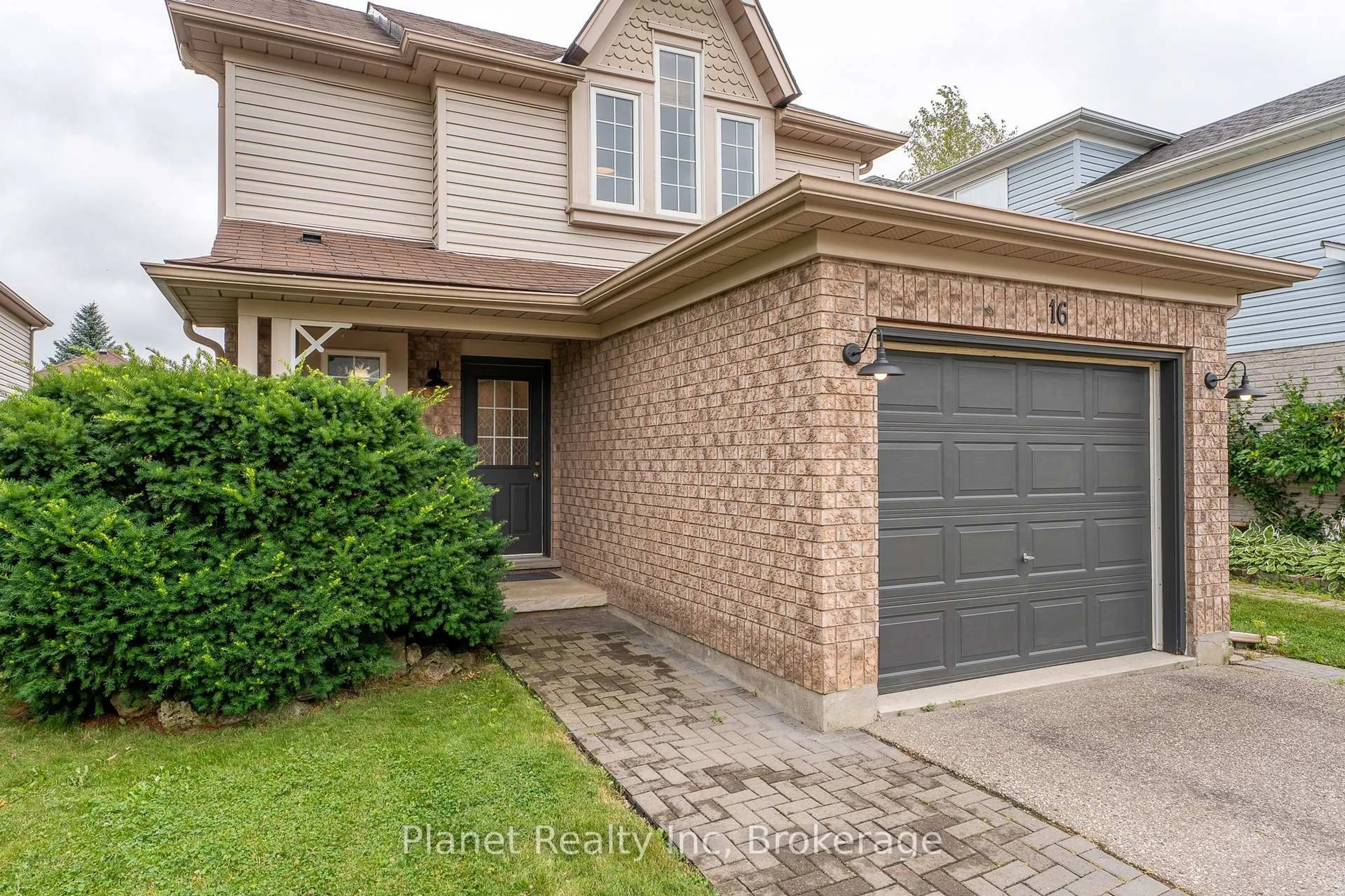 Home with brick exterior material, street for 16 Southcreek Tr, Guelph Ontario N1G 4Y8