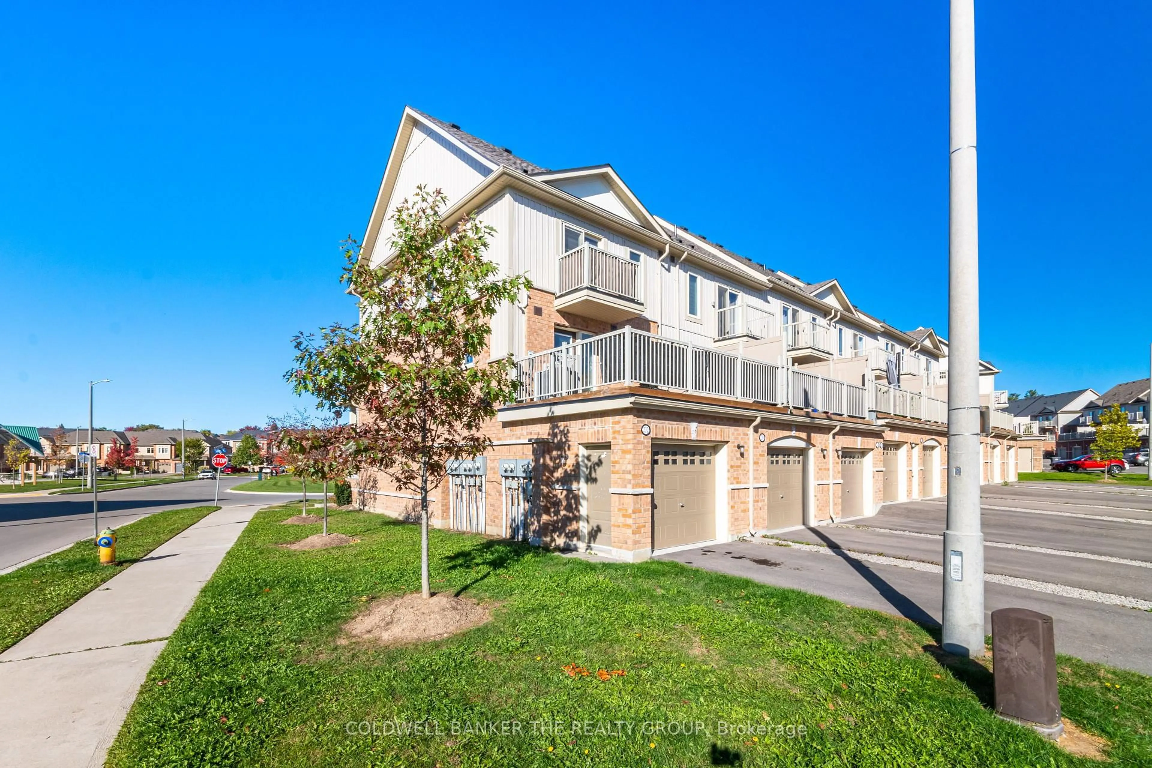 A pic from outside/outdoor area/front of a property/back of a property/a pic from drone, street for 232 law Dr #57, Guelph Ontario N1E 0P6