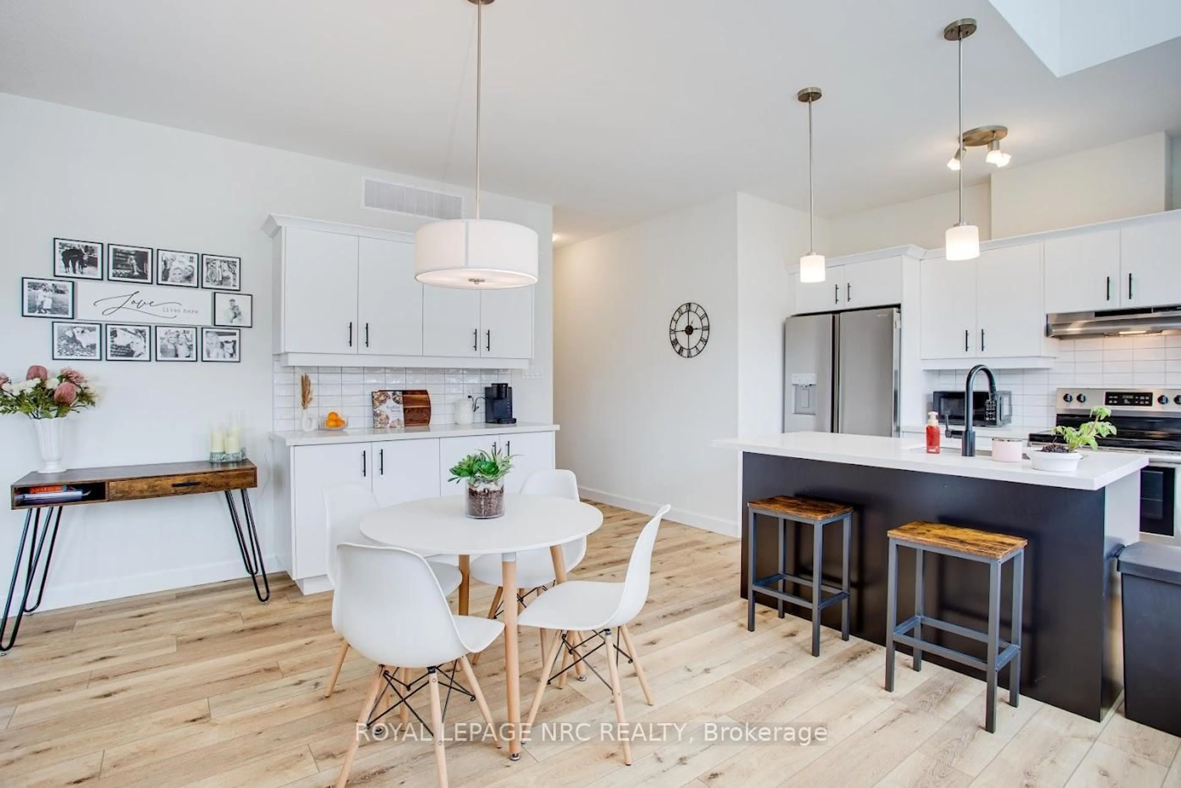 Open concept kitchen, wood/laminate floor for 12 SHORES Lane #B, Fort Erie Ontario L0S 1B0