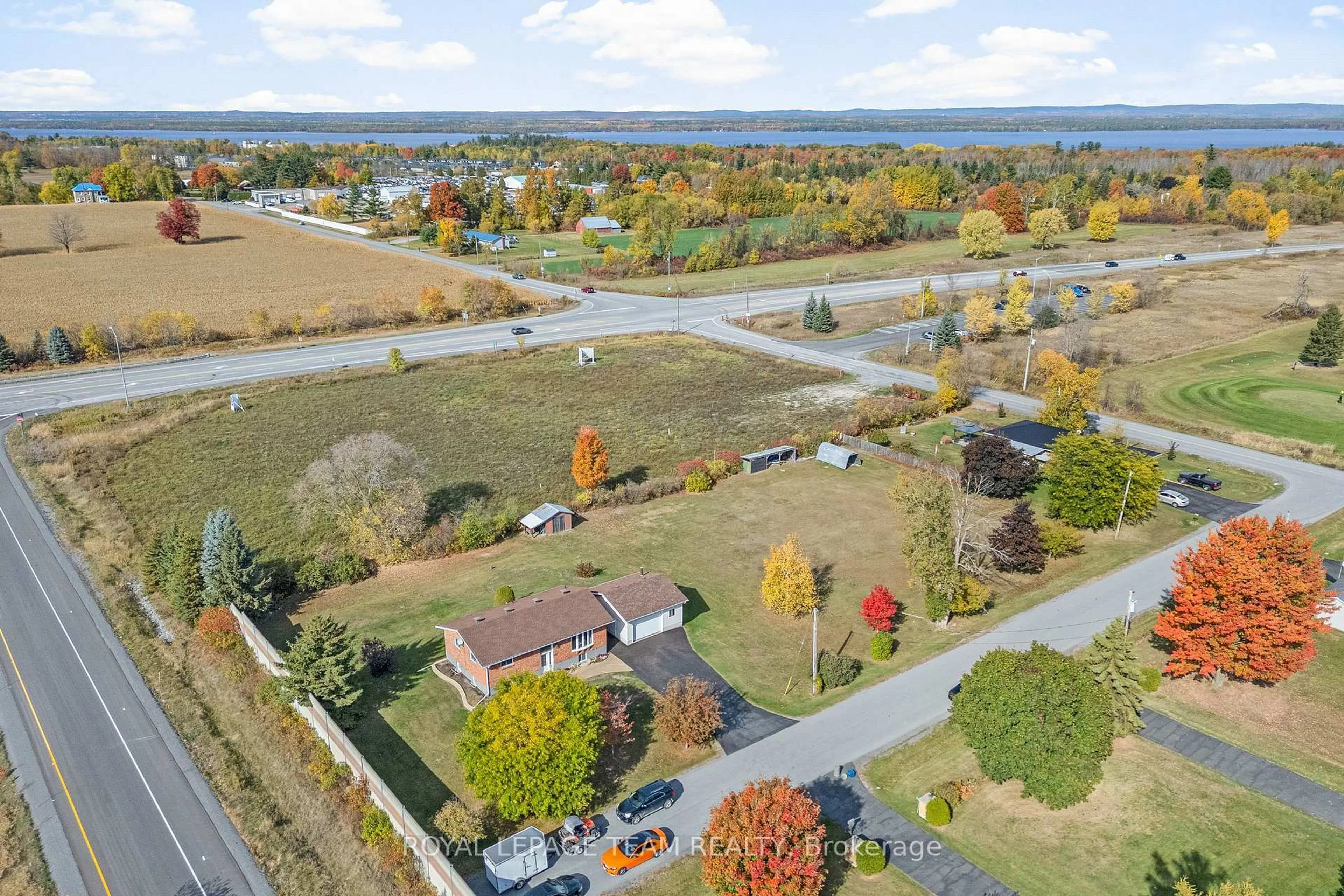 A pic from outside/outdoor area/front of a property/back of a property/a pic from drone, water/lake/river/ocean view for 1059 Flynn Ave, Ottawa Ontario K7S 3G7