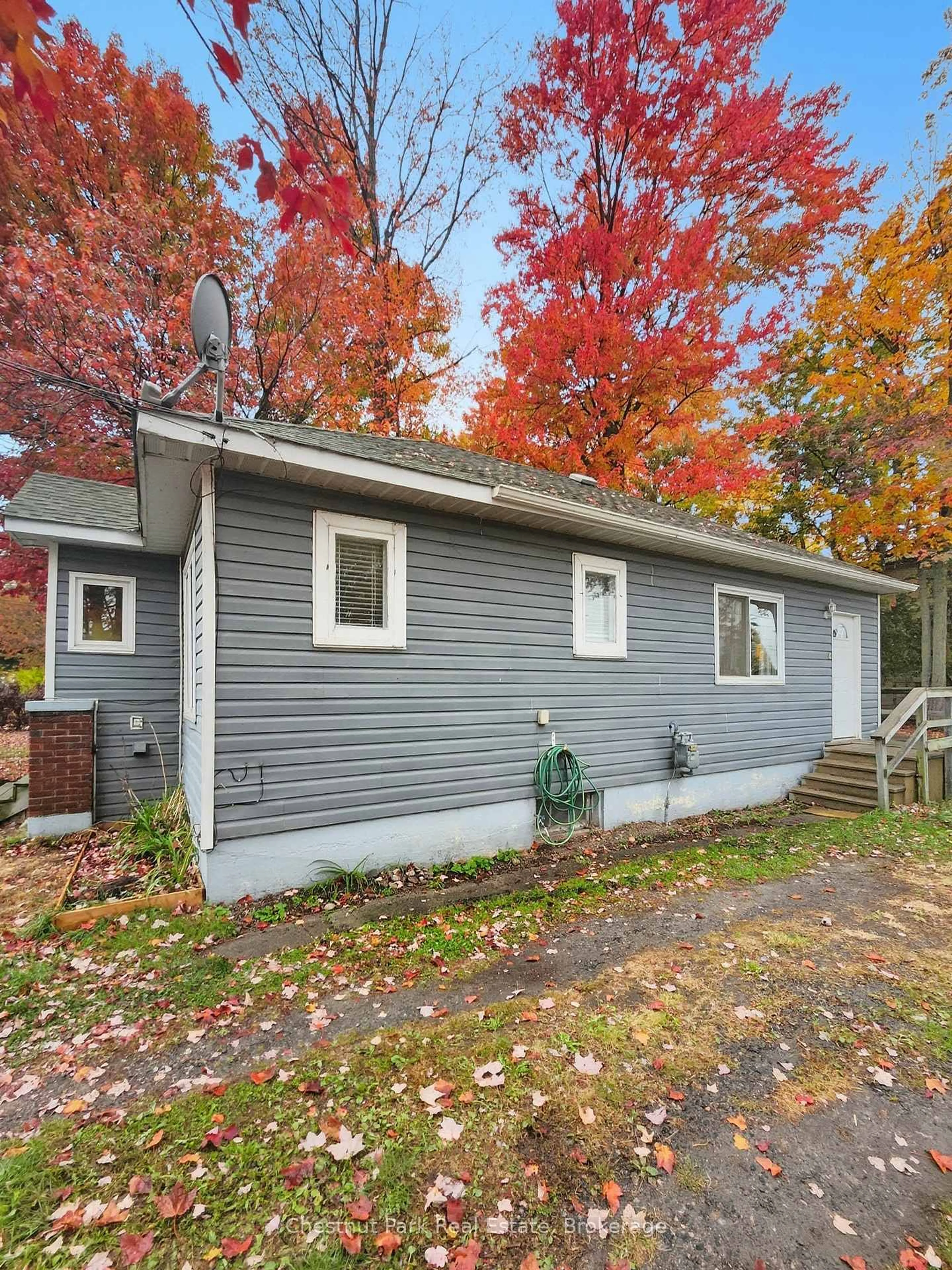 Home with vinyl exterior material, street for 7 Clifford Ave, North Bay Ontario P1A 1N9