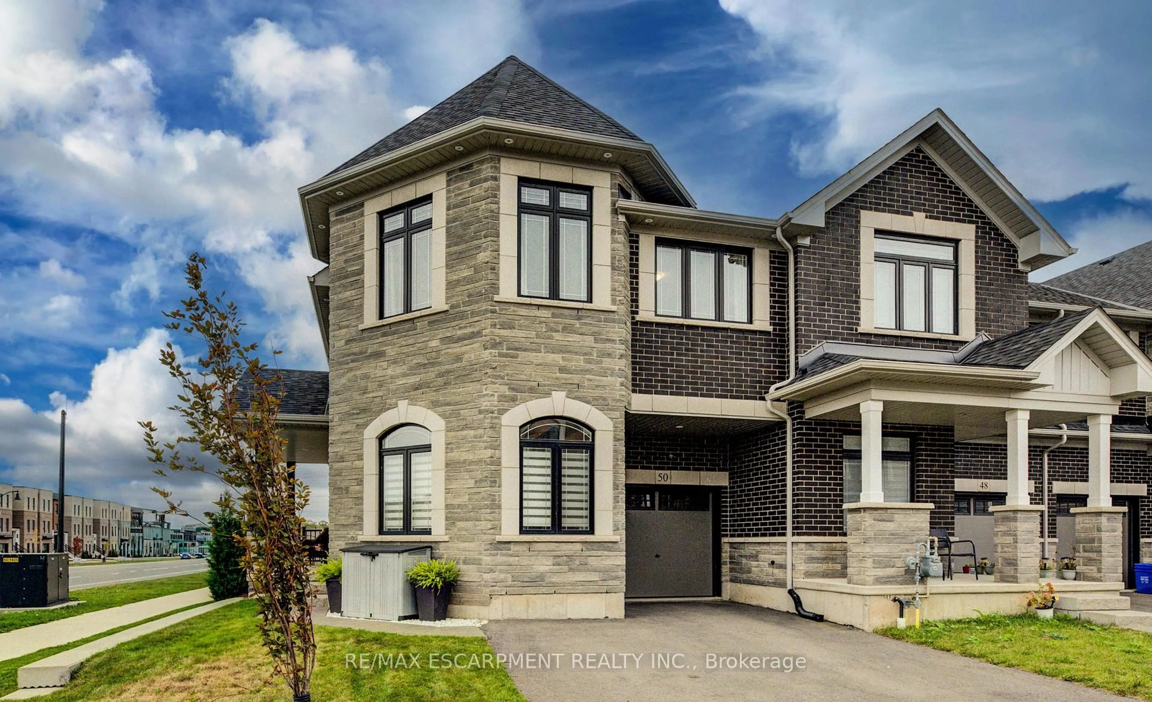 Home with brick exterior material, street for 50 Kenesky Dr, Hamilton Ontario L8B 1Y2