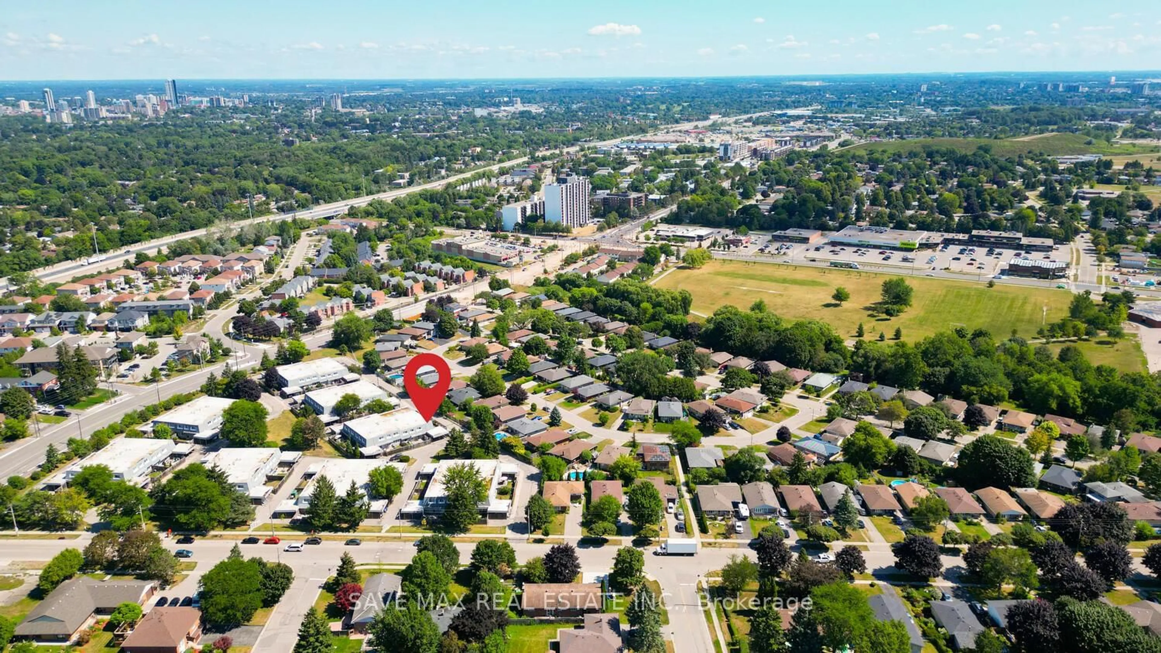 A pic from outside/outdoor area/front of a property/back of a property/a pic from drone, street for 14 Williamsburg Rd #38, Kitchener Ontario N2E 1W1