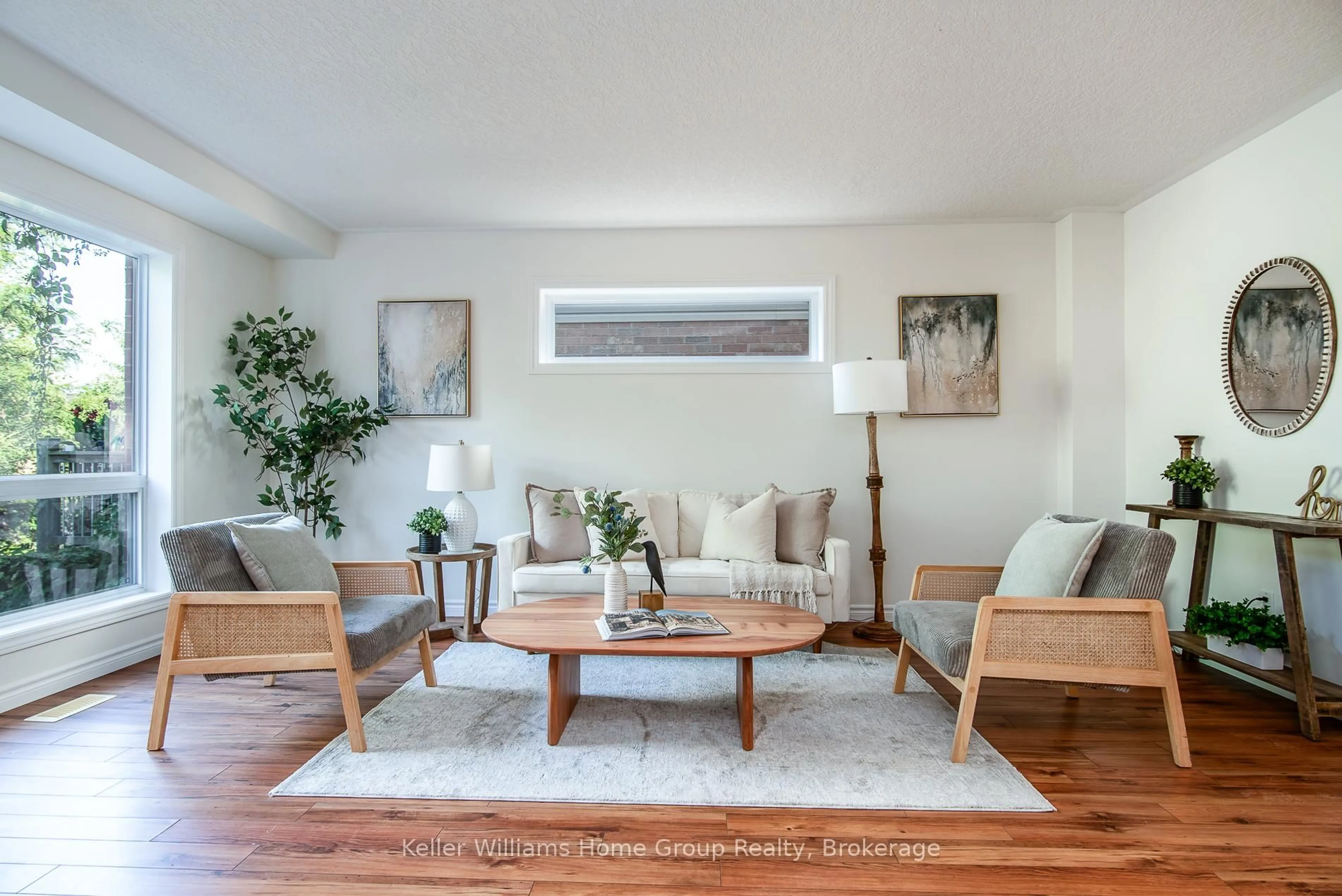 Living room with furniture, wood/laminate floor for 230 Rickson Ave, Guelph Ontario N1G 5H1