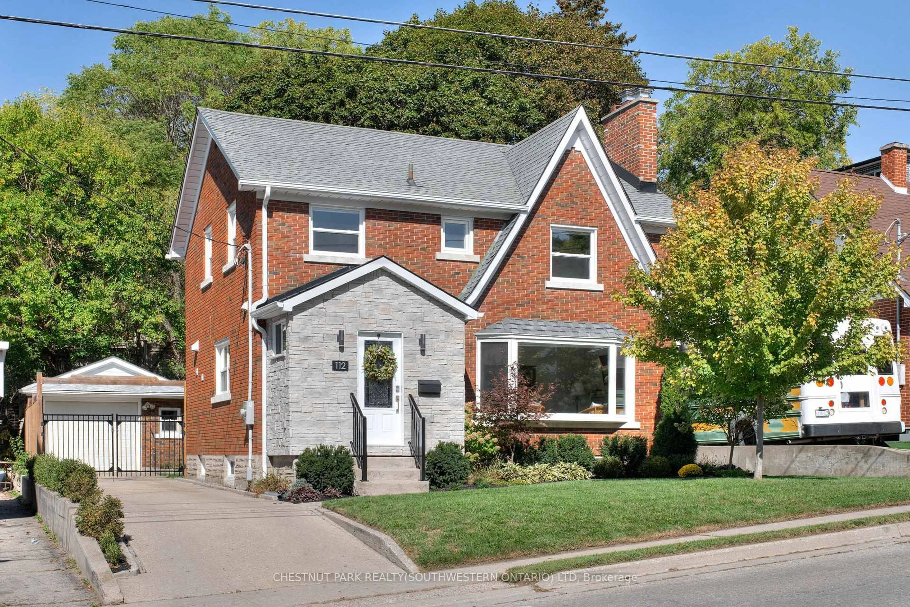 Home with brick exterior material, street for 112 Cedar St, Kitchener Ontario N2G 3L9