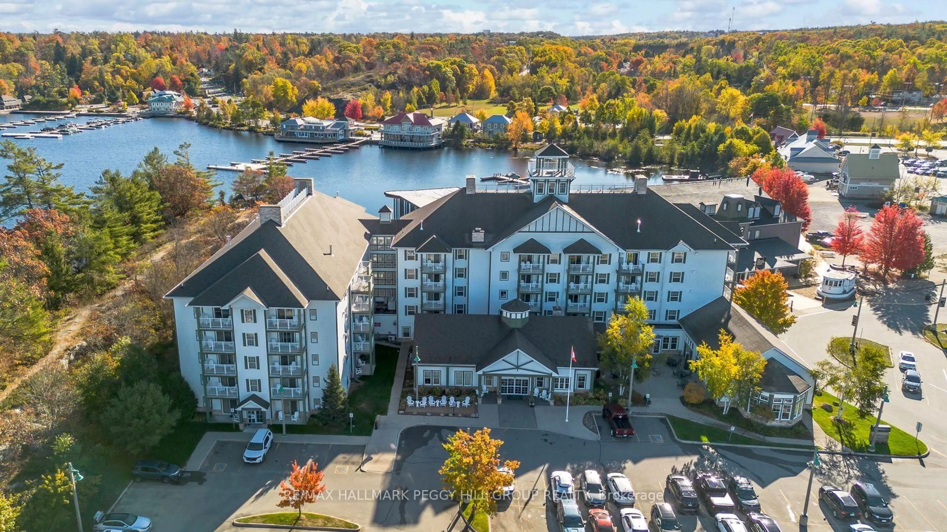A pic from outside/outdoor area/front of a property/back of a property/a pic from drone, water/lake/river/ocean view for 285 Steamship Bay Rd #410, Gravenhurst Ontario P1P 1Z9
