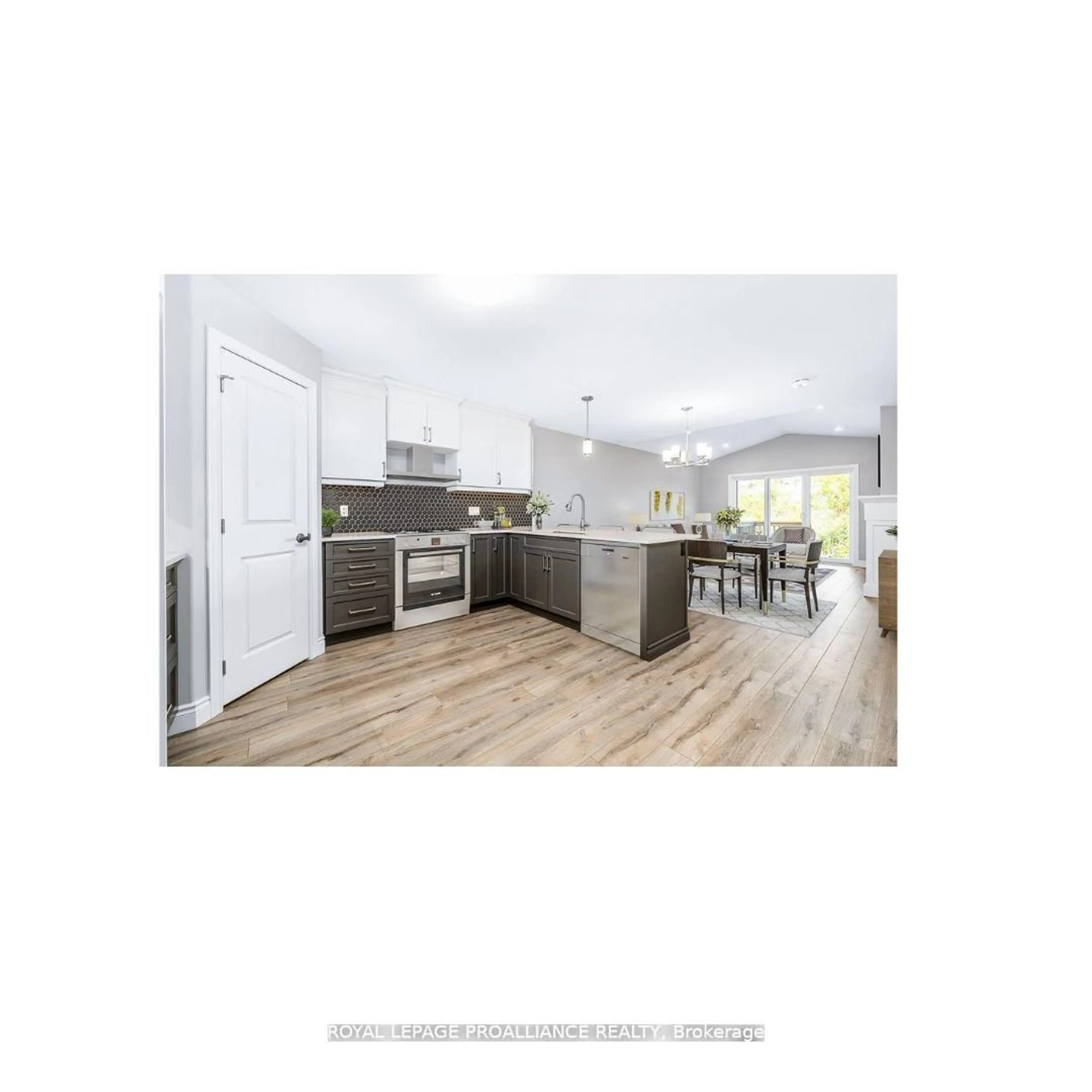 Open concept kitchen, wood/laminate floor for Blk13-2 Homewood Ave, Trent Hills Ontario K0L 1Y0