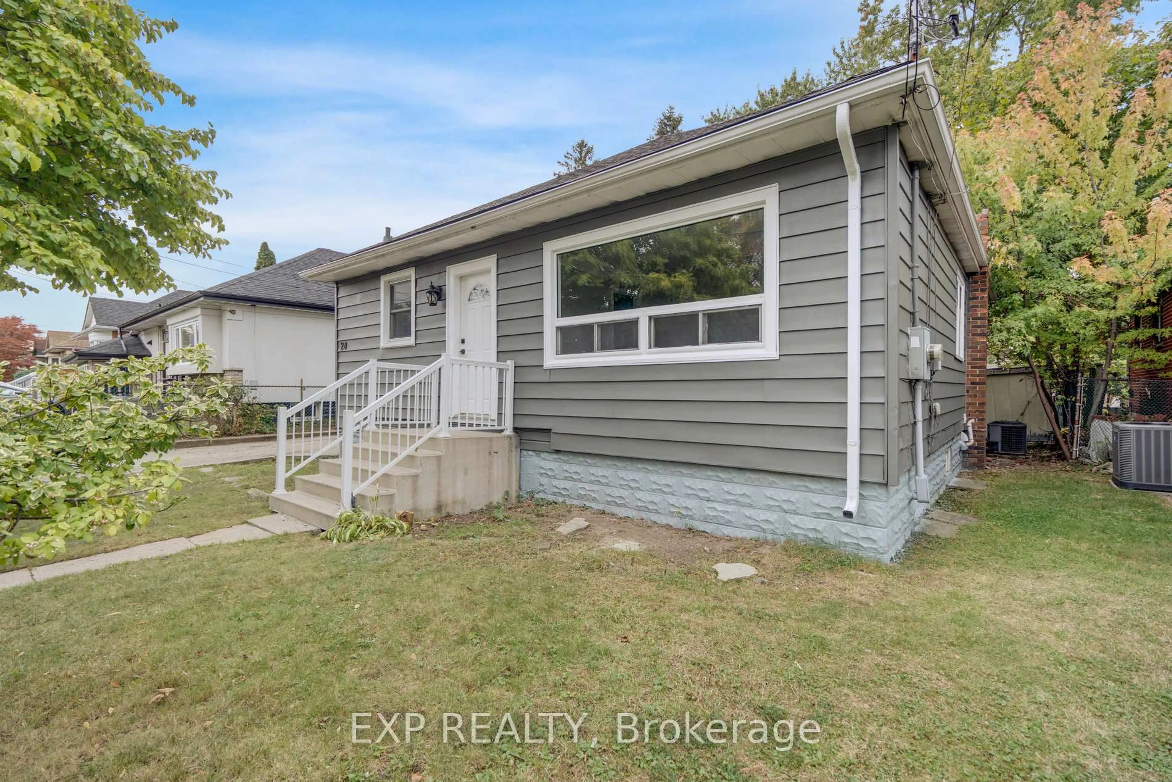 Home with vinyl exterior material, street for 20 West 4th St, Hamilton Ontario L9C 3M3