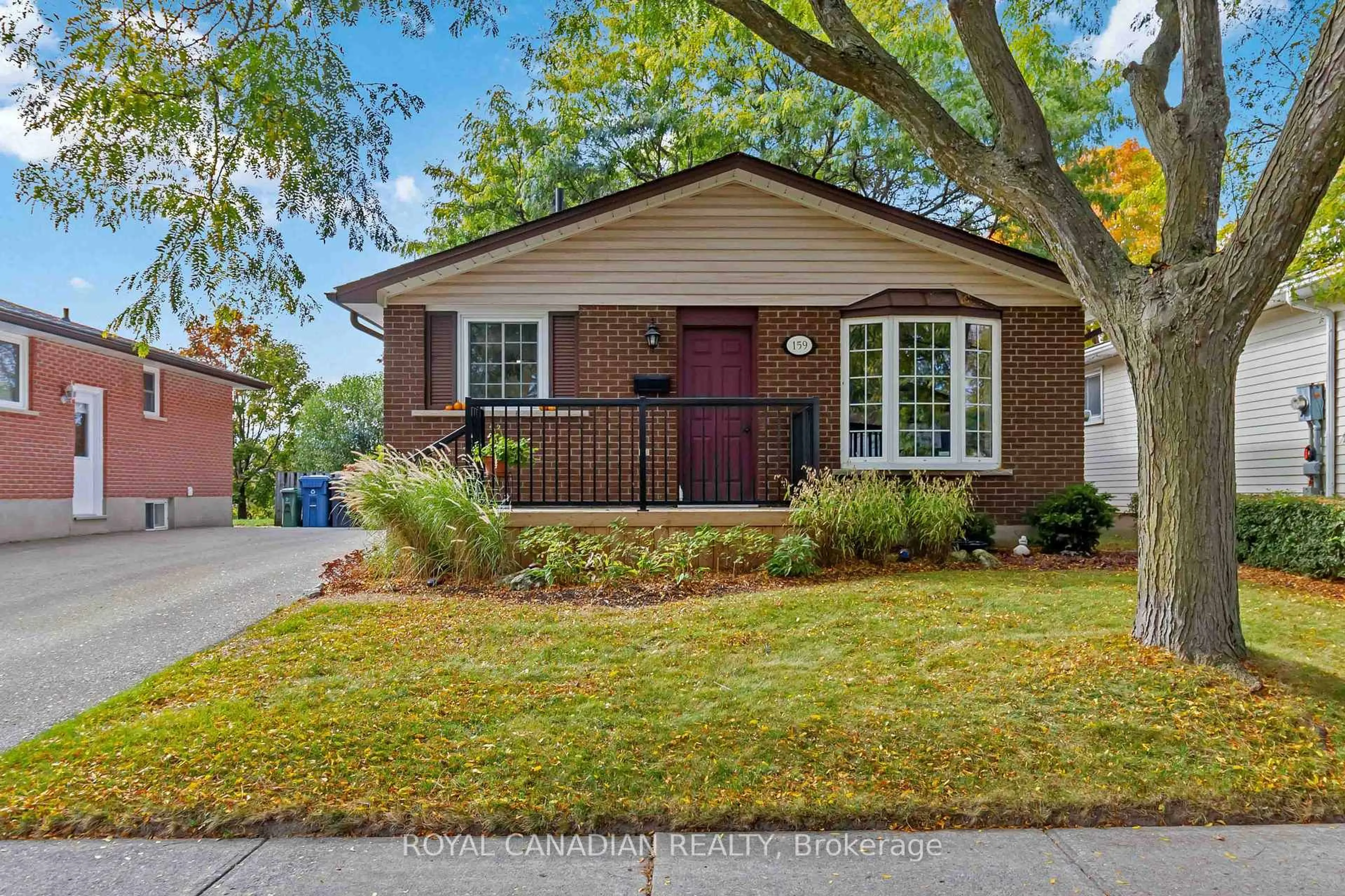 Home with brick exterior material, street for 159 Hadati Rd, Guelph Ontario N1E 6N3