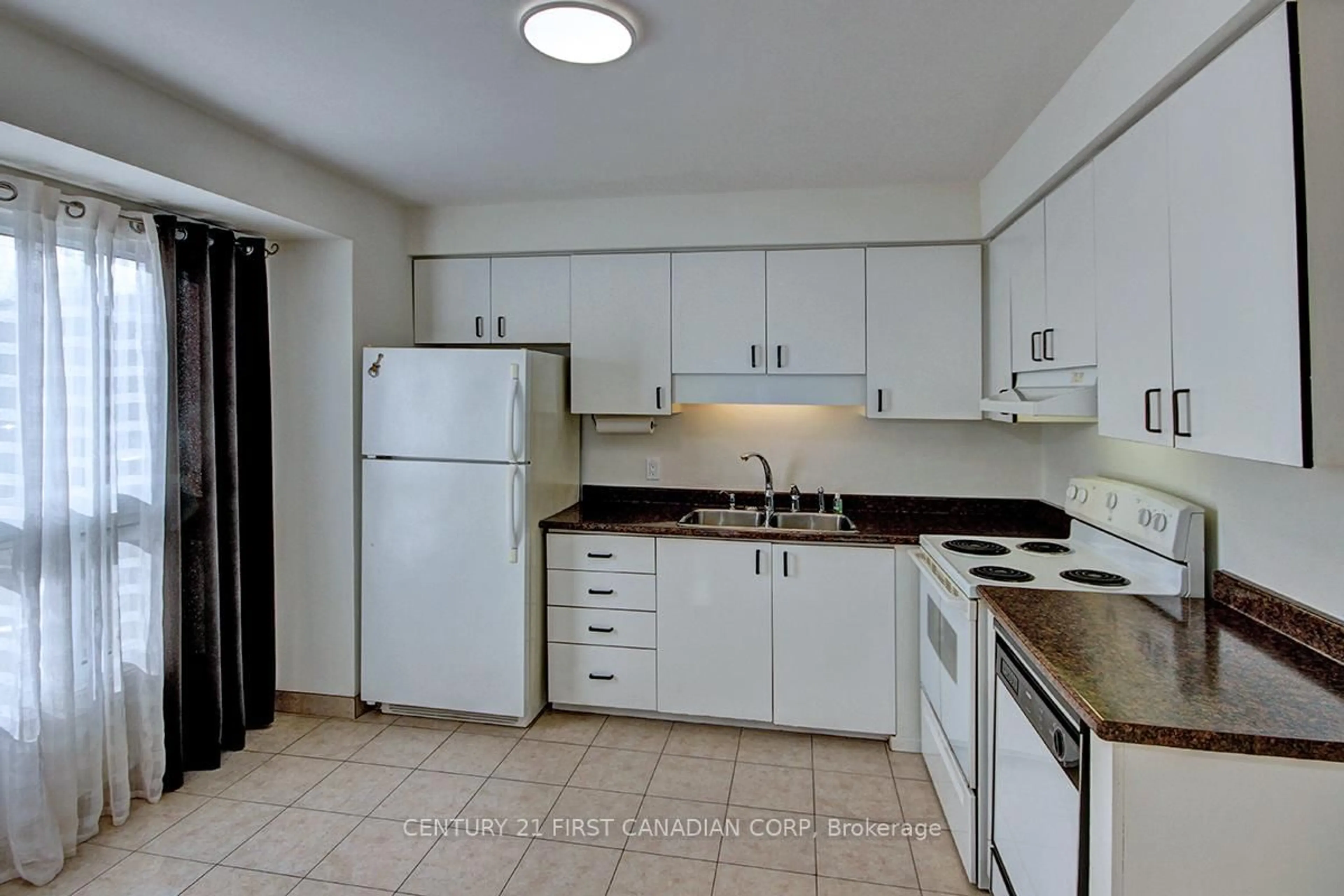 Standard kitchen, ceramic/tile floor for 75 Ansondale Rd #12, London South Ontario N6C 5W3