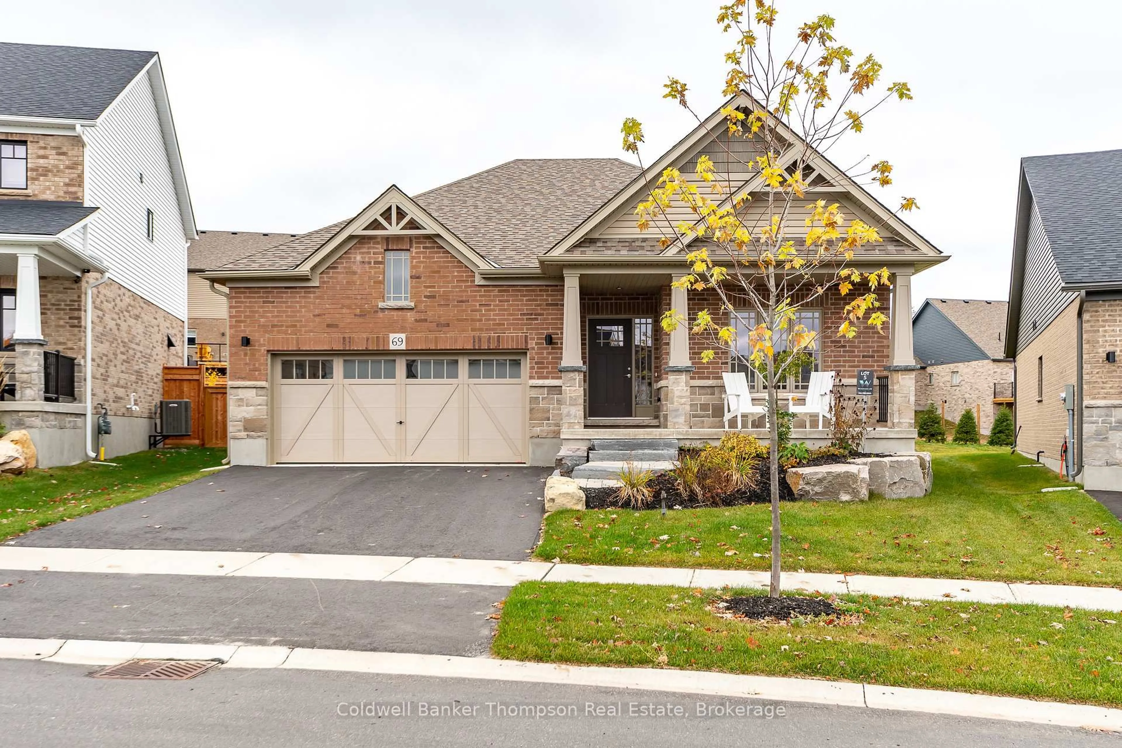 Home with brick exterior material, street for 69 Eaglecrest Ave, Huntsville Ontario P1H 0G5