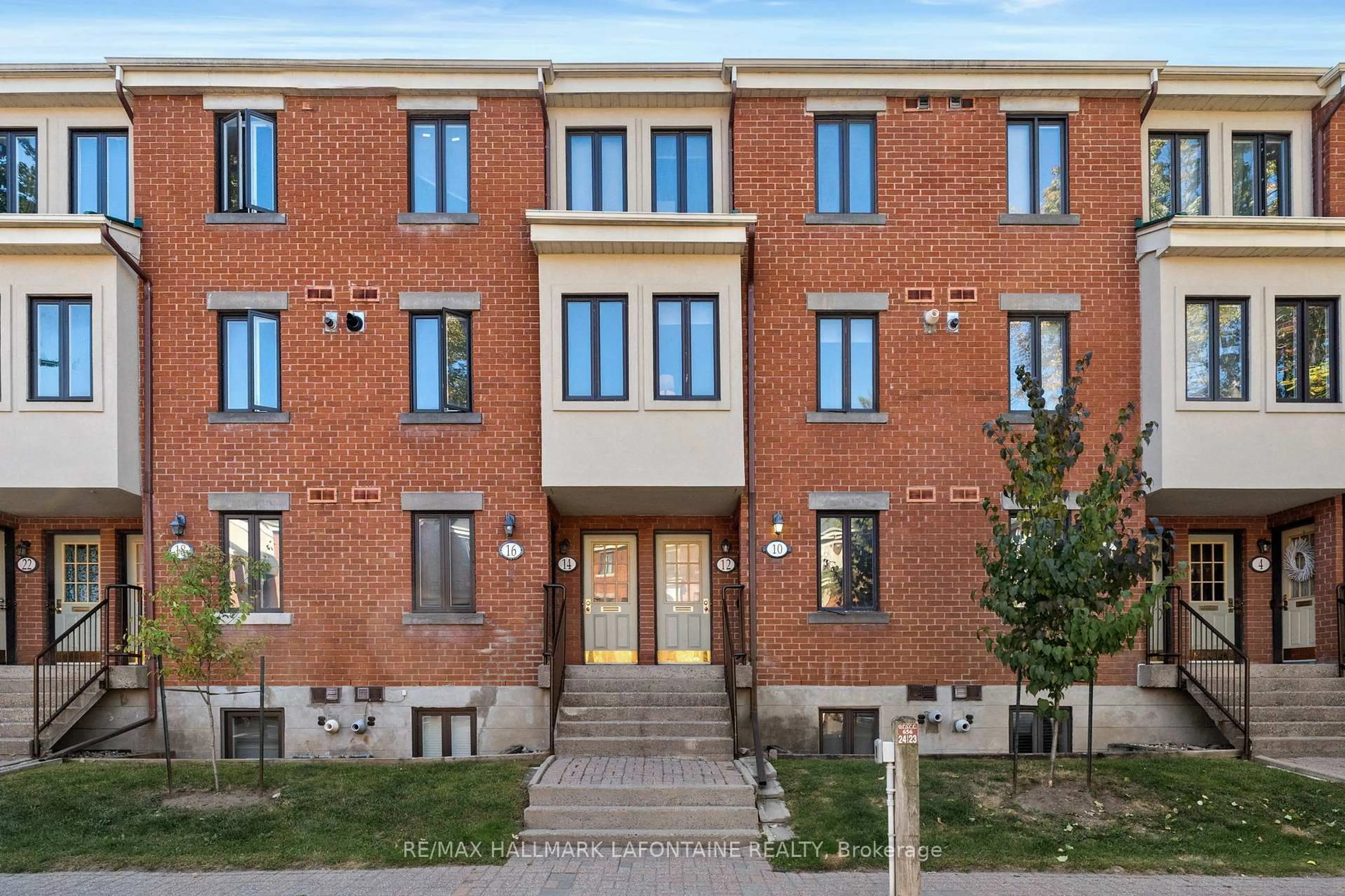 Home with brick exterior material, street for 12 Crispin Private, Ottawa Ontario K1K 2T8