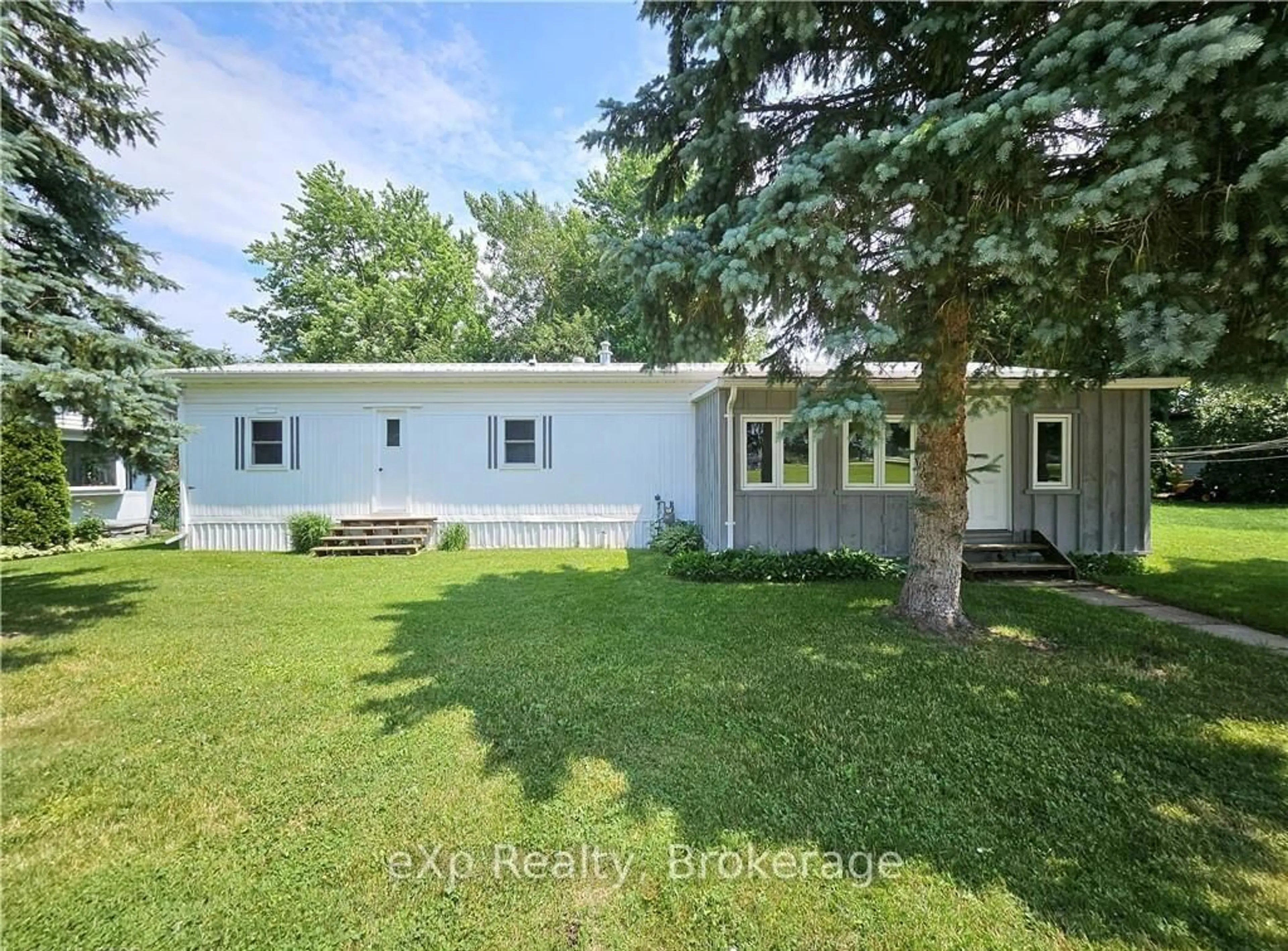 A pic from outside/outdoor area/front of a property/back of a property/a pic from drone, unknown for 84 Wellington St #2, Mapleton Ontario N0G 1P0