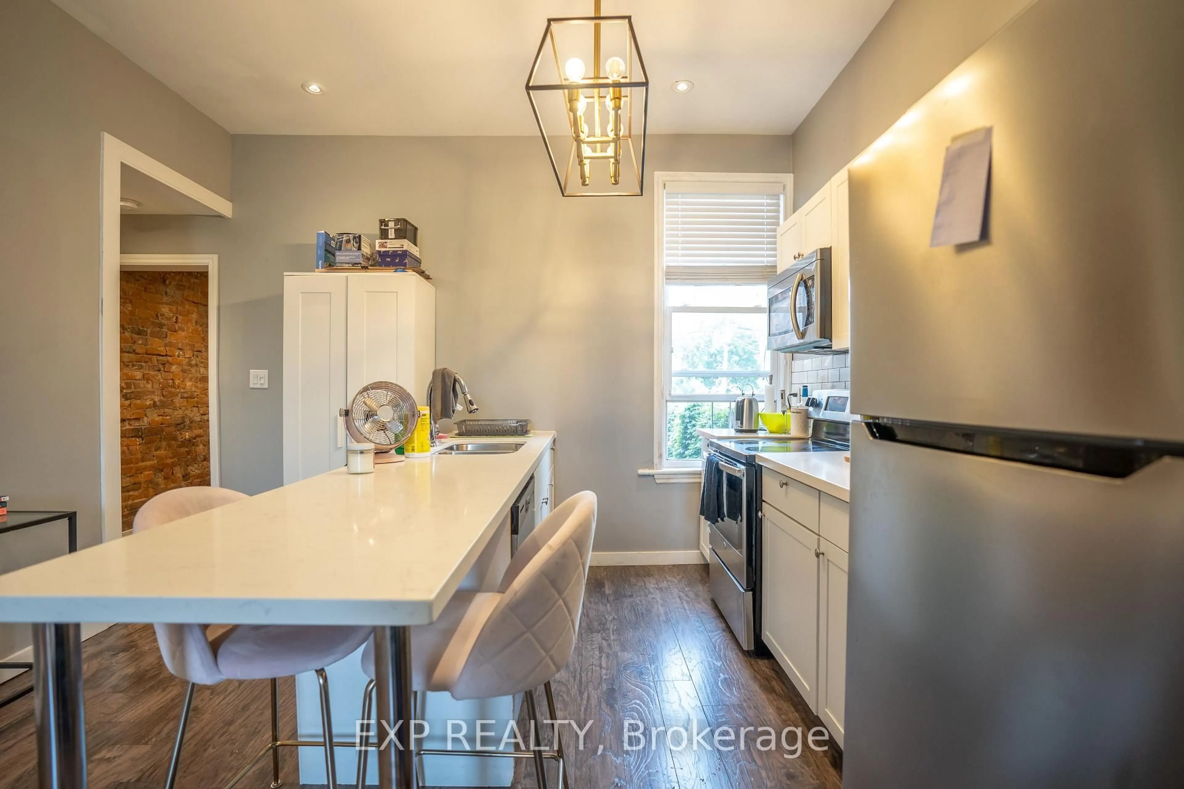 Open concept kitchen, ceramic/tile floor for 165 Emerald St, Hamilton Ontario L8L 5K9