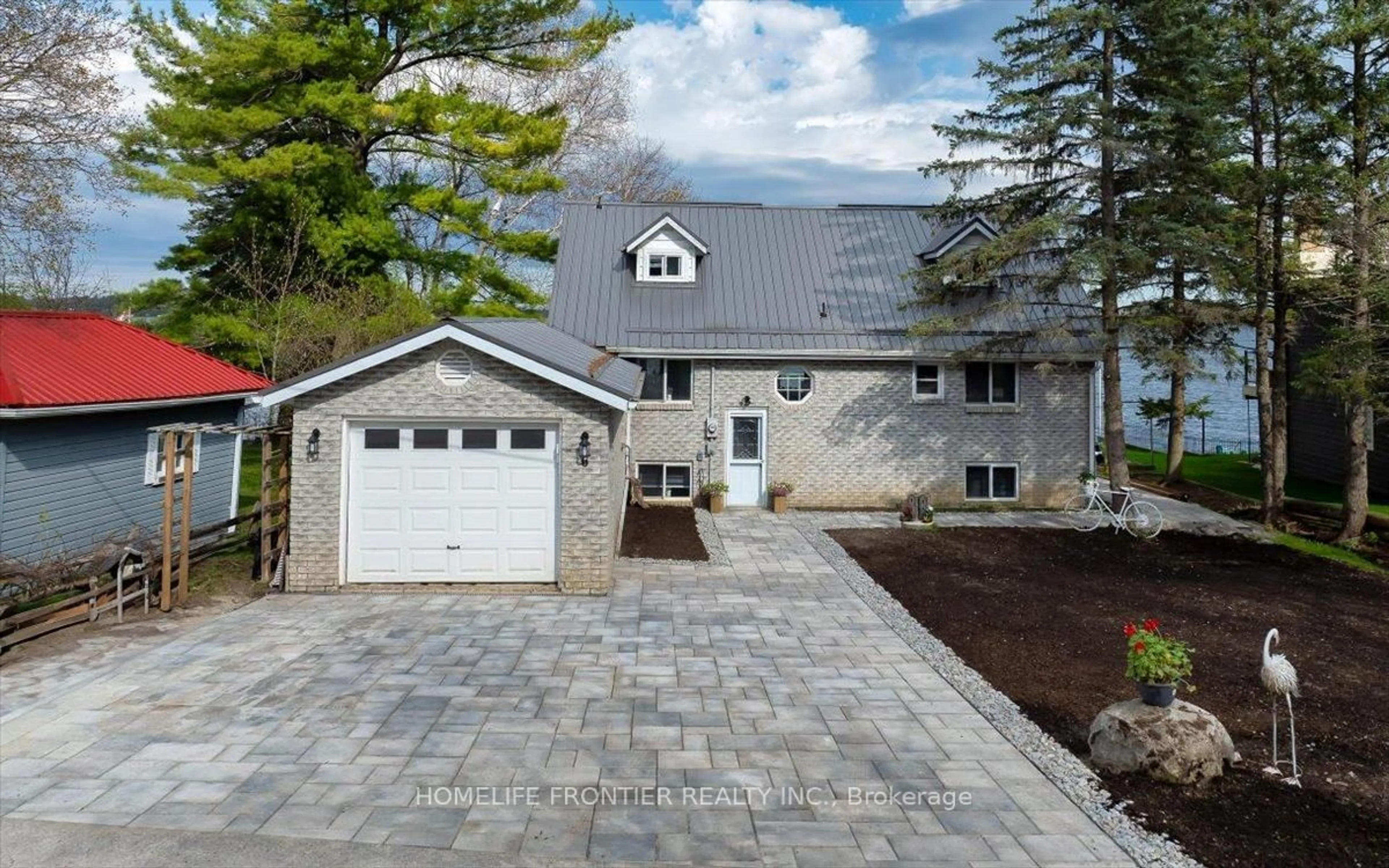 Home with brick exterior material, street for 6 Lakeview Park Rd, Kawartha Lakes Ontario K0M 1G0