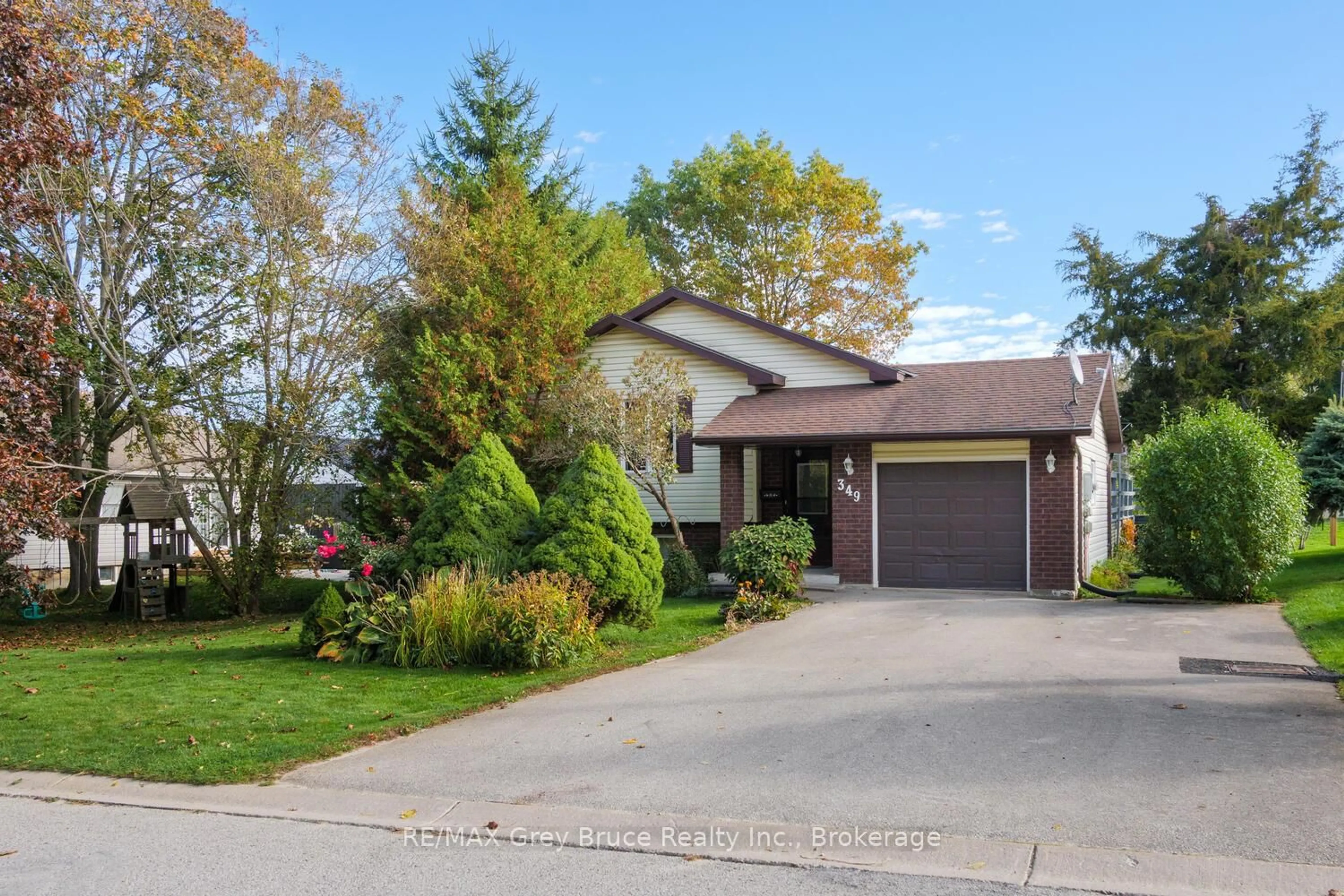 Home with vinyl exterior material, street for 349 Taylor St, South Bruce Peninsula Ontario N0H 2T0