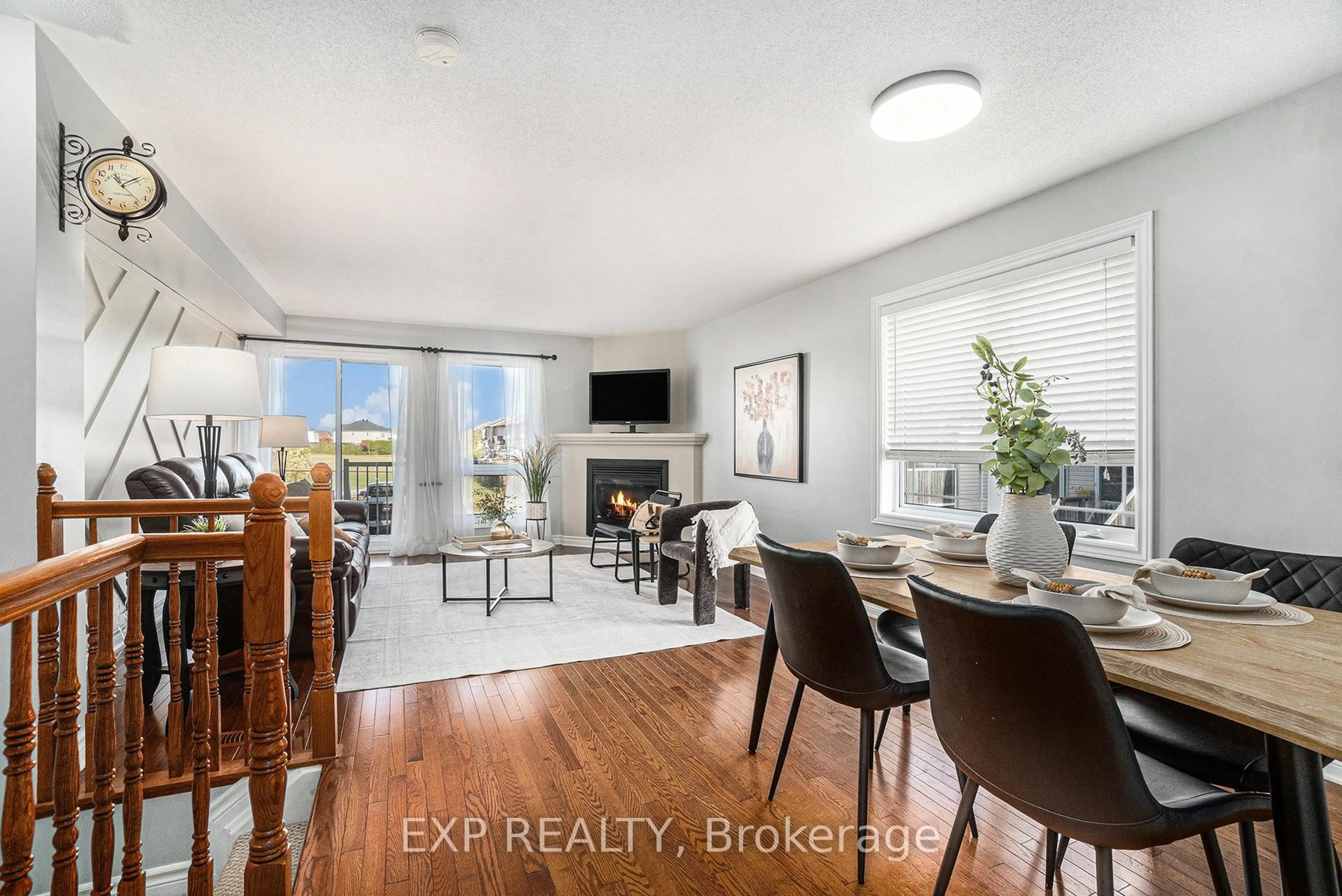 Living room with furniture, wood/laminate floor for 446 Harvest Valley Ave, Ottawa Ontario K4A 0V6