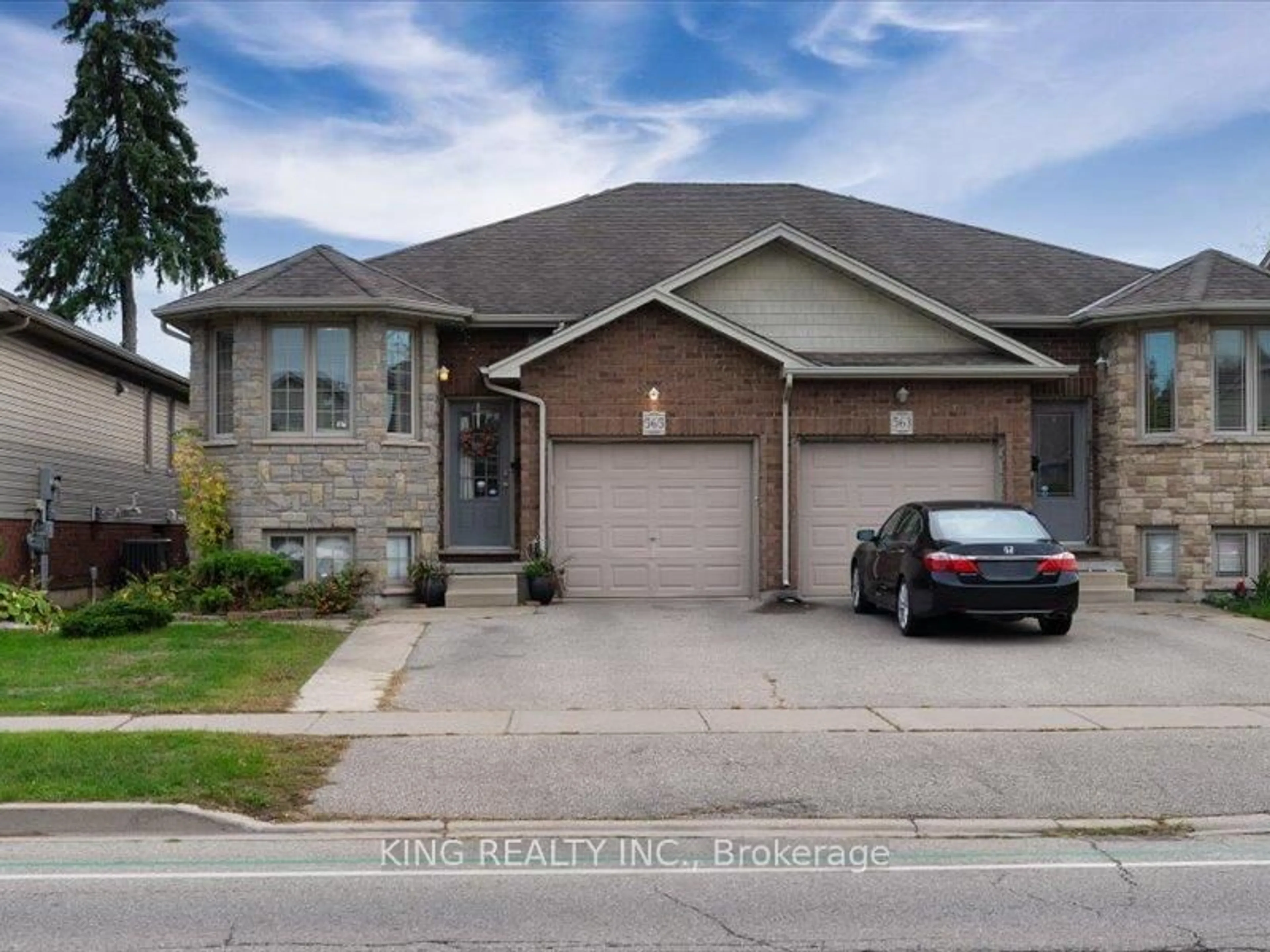 Home with brick exterior material, street for 565 Grey St, Brantford Ontario N3S 0C3