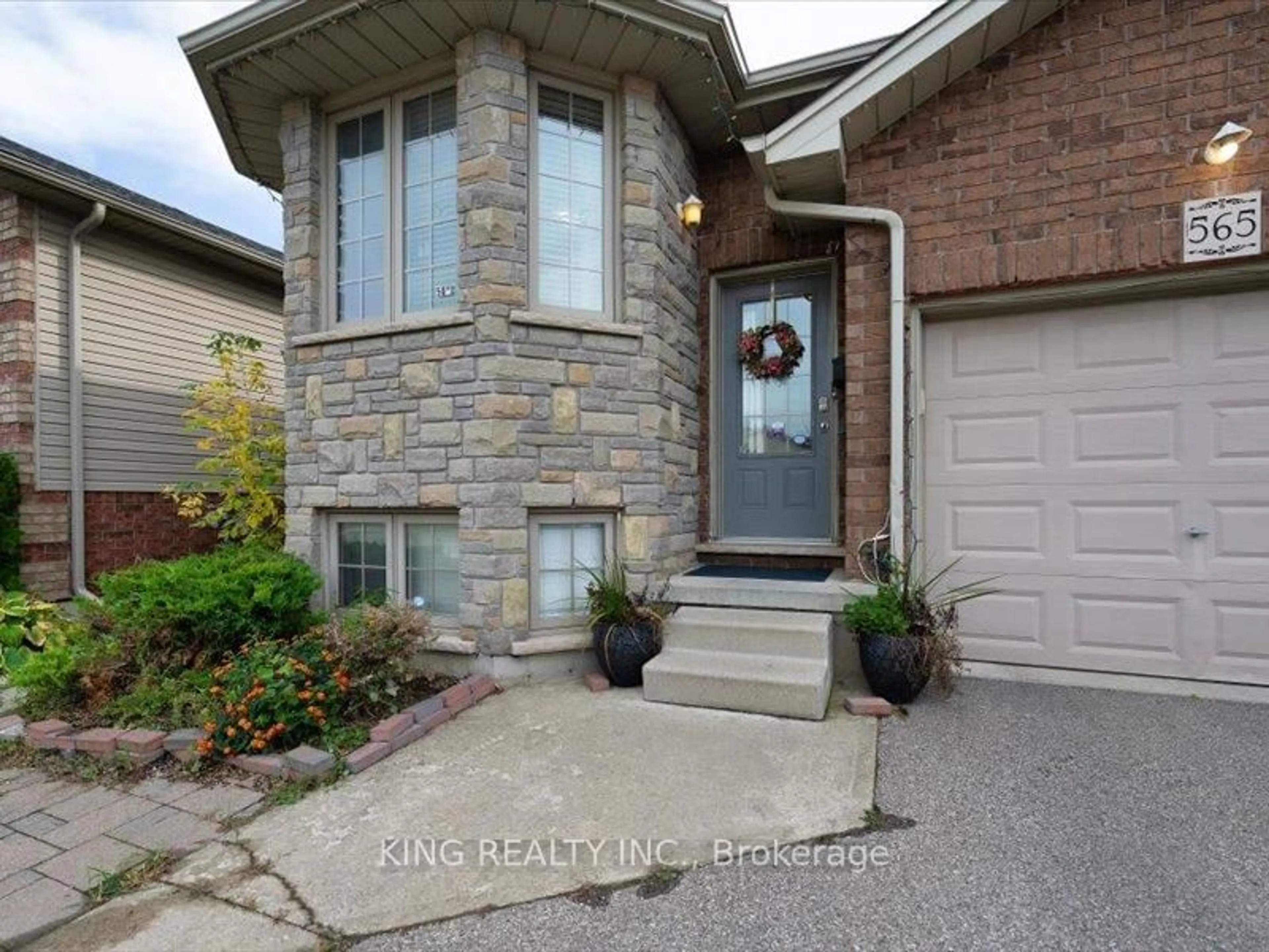 Home with brick exterior material, street for 565 Grey St, Brantford Ontario N3S 0C3