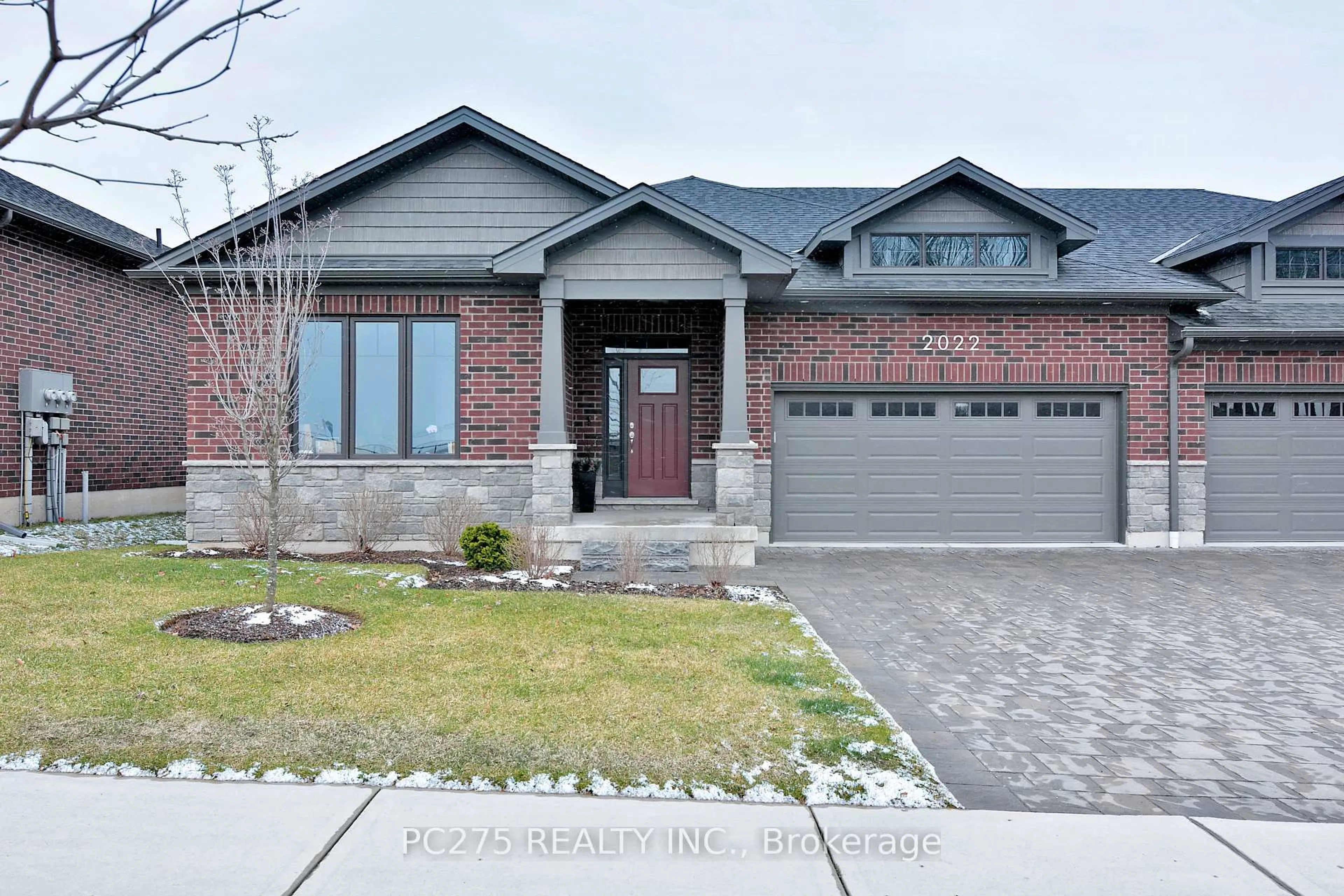 Home with brick exterior material, street for 2022 UPPERPOINT Blvd #10, London South Ontario N6K 4M9