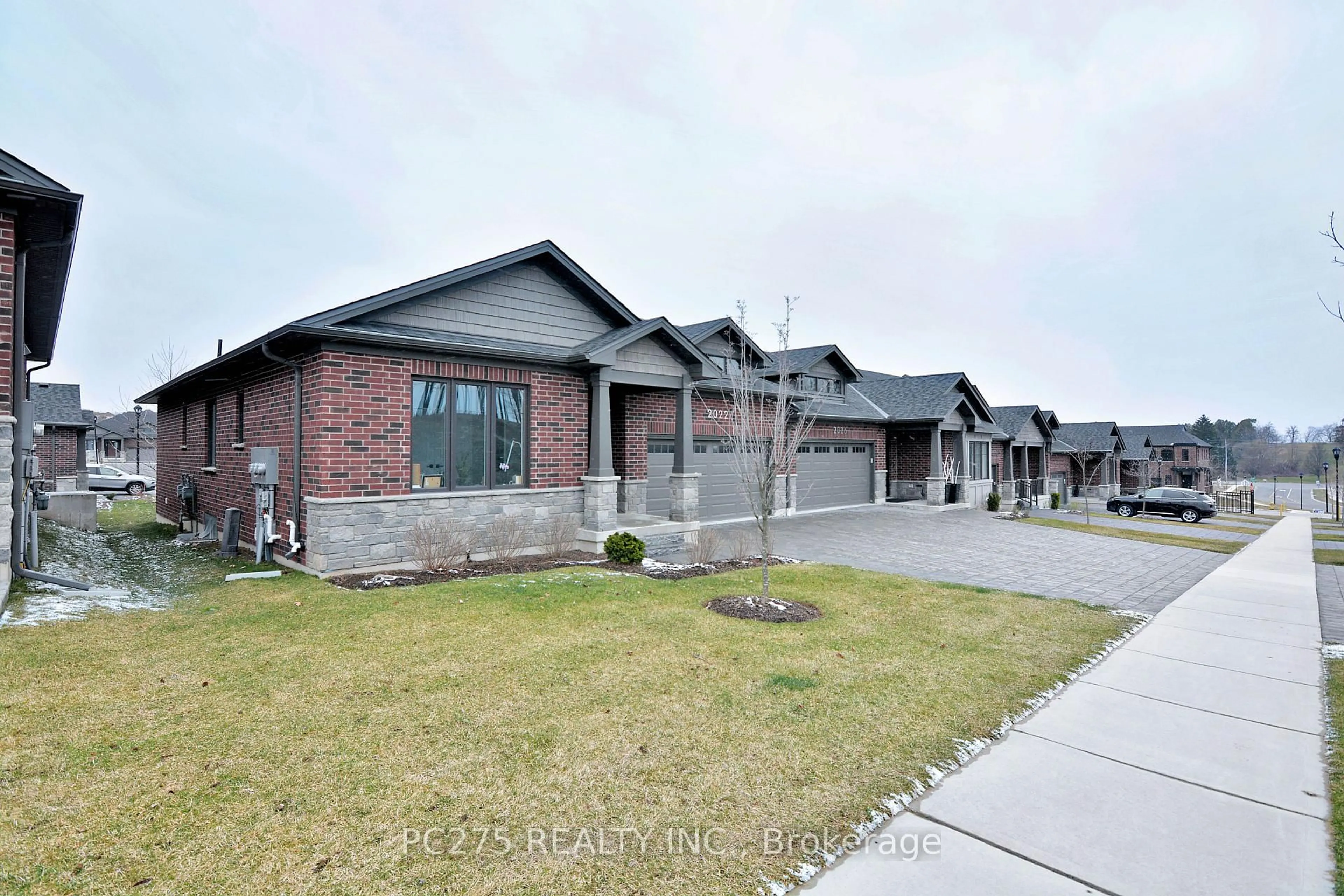 Home with brick exterior material, street for 2022 UPPERPOINT Blvd #10, London South Ontario N6K 4M9
