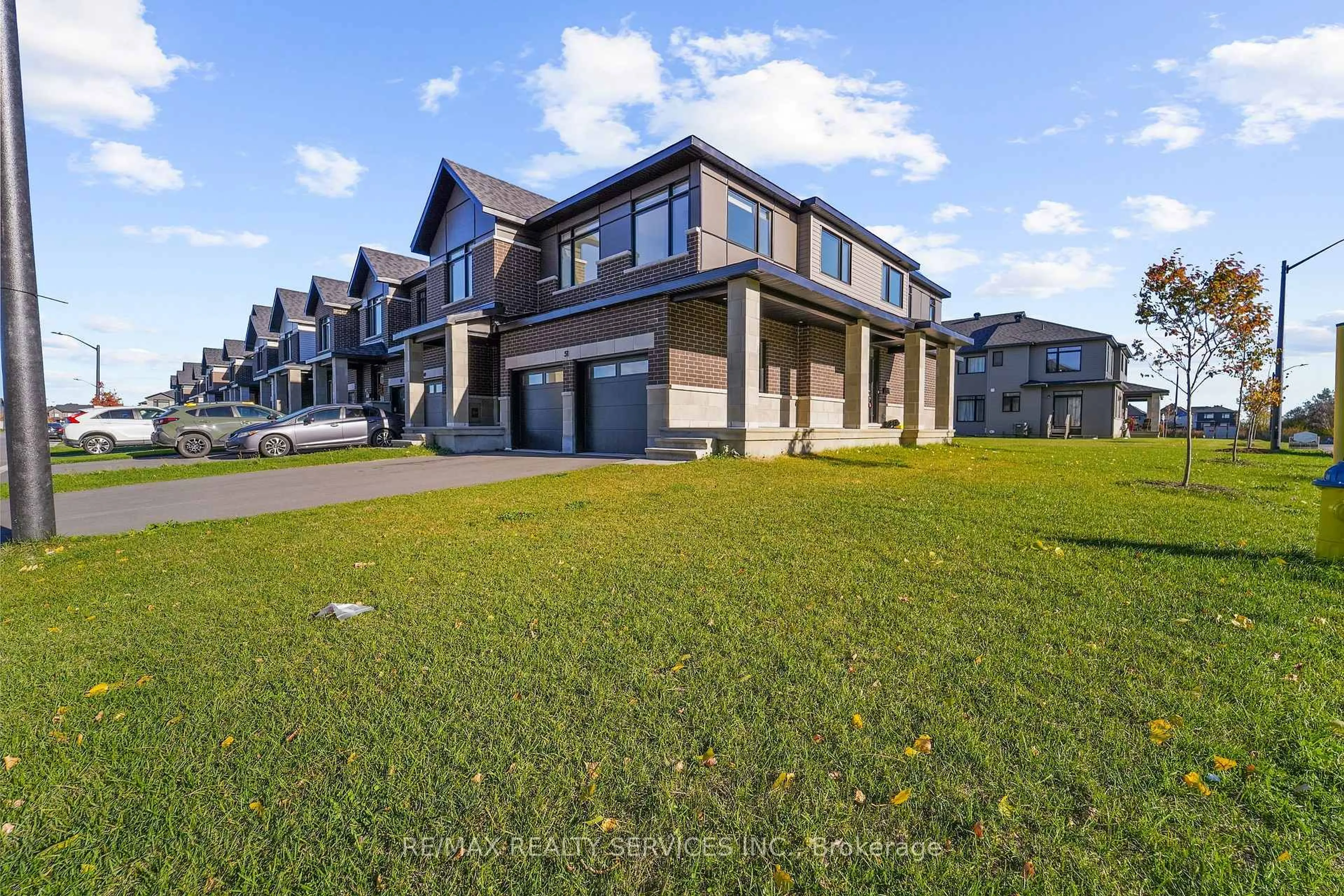 A pic from outside/outdoor area/front of a property/back of a property/a pic from drone, unknown for 51 Moosonee Cres, Ottawa Ontario K4M 0M1