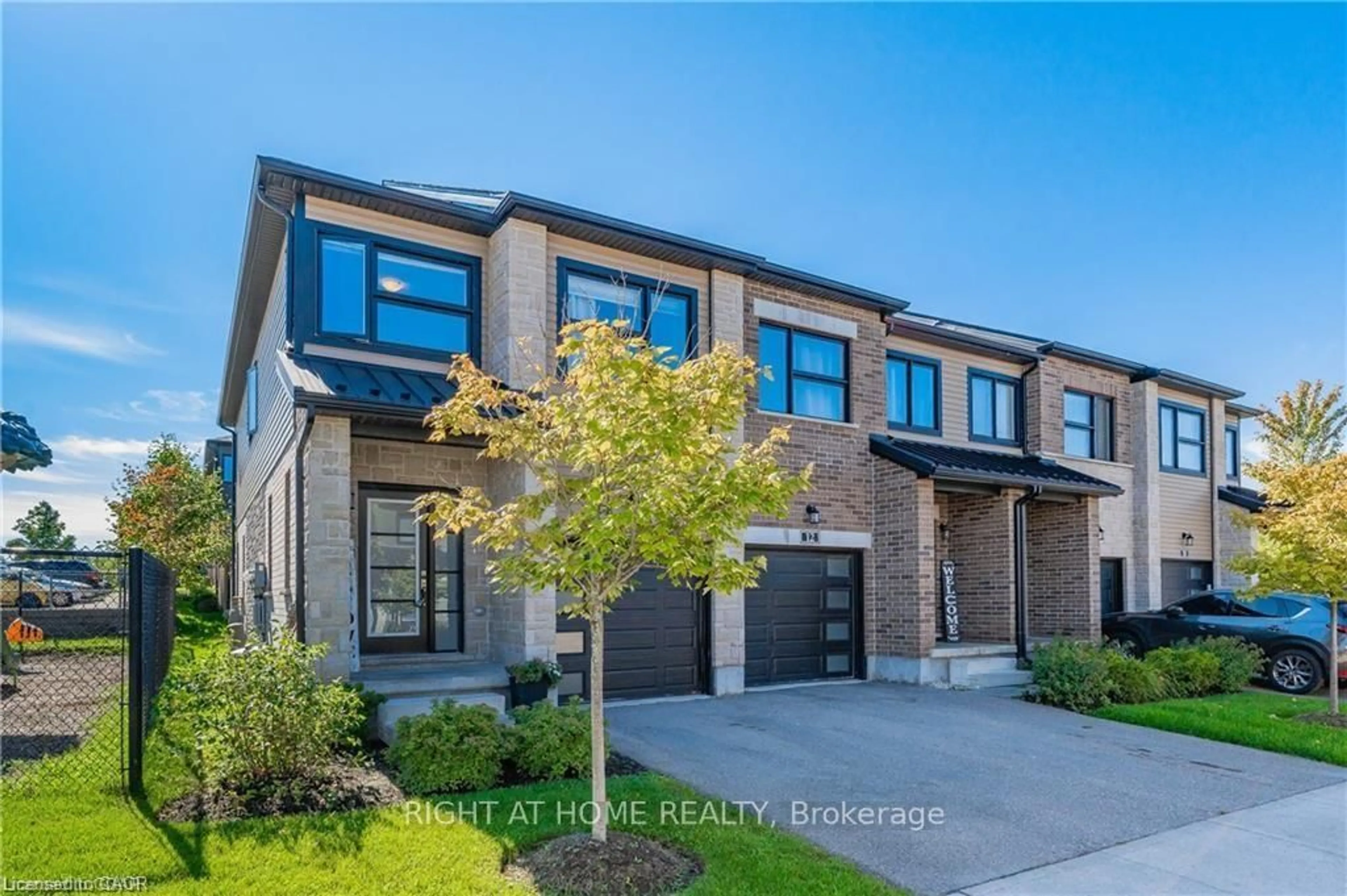 Home with brick exterior material, street for 91 poppy Dr #13, Guelph Ontario N1L 0M6