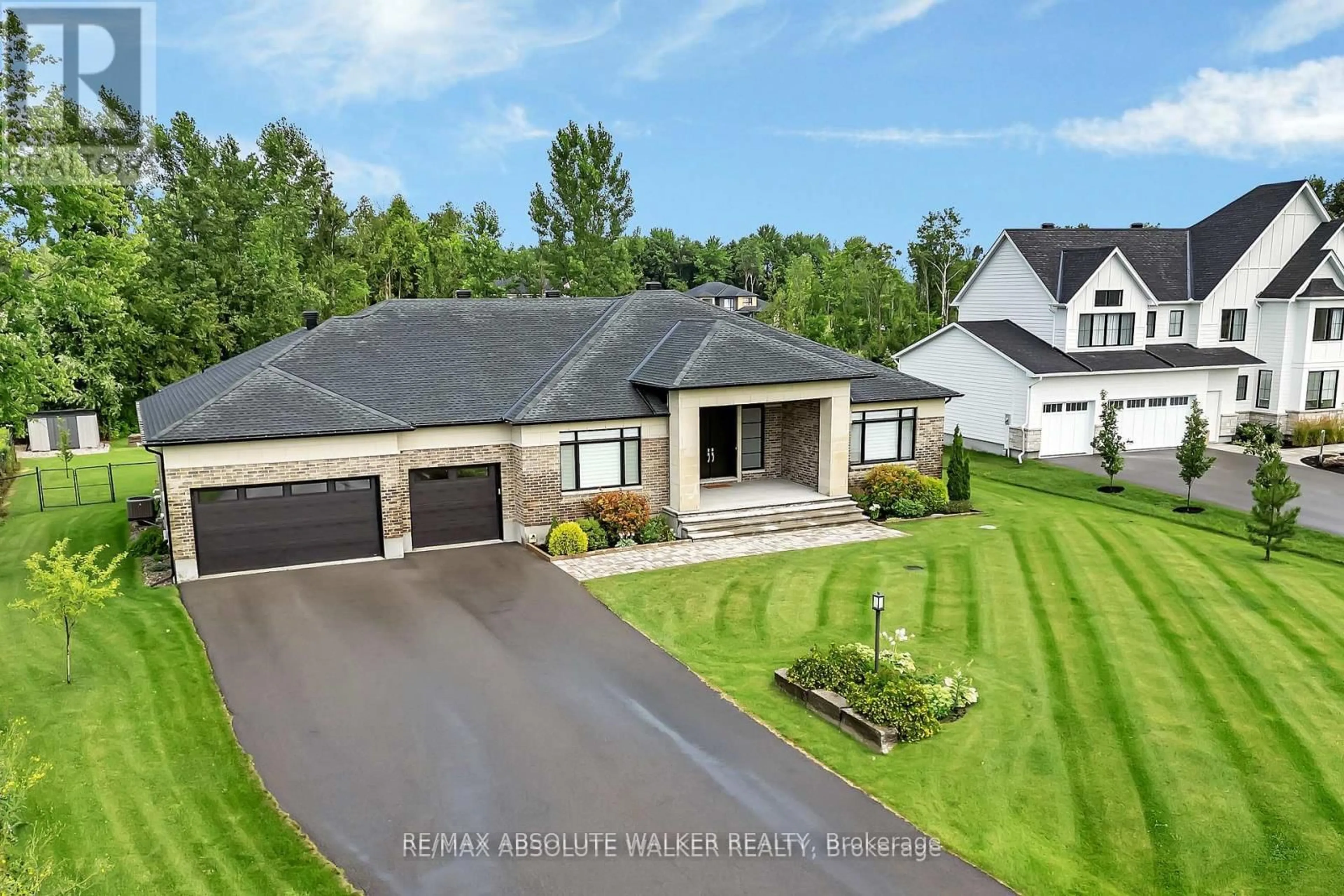 A pic from outside/outdoor area/front of a property/back of a property/a pic from drone, unknown for 700 Mcmanus Ave, Manotick Ontario K4M 0B2