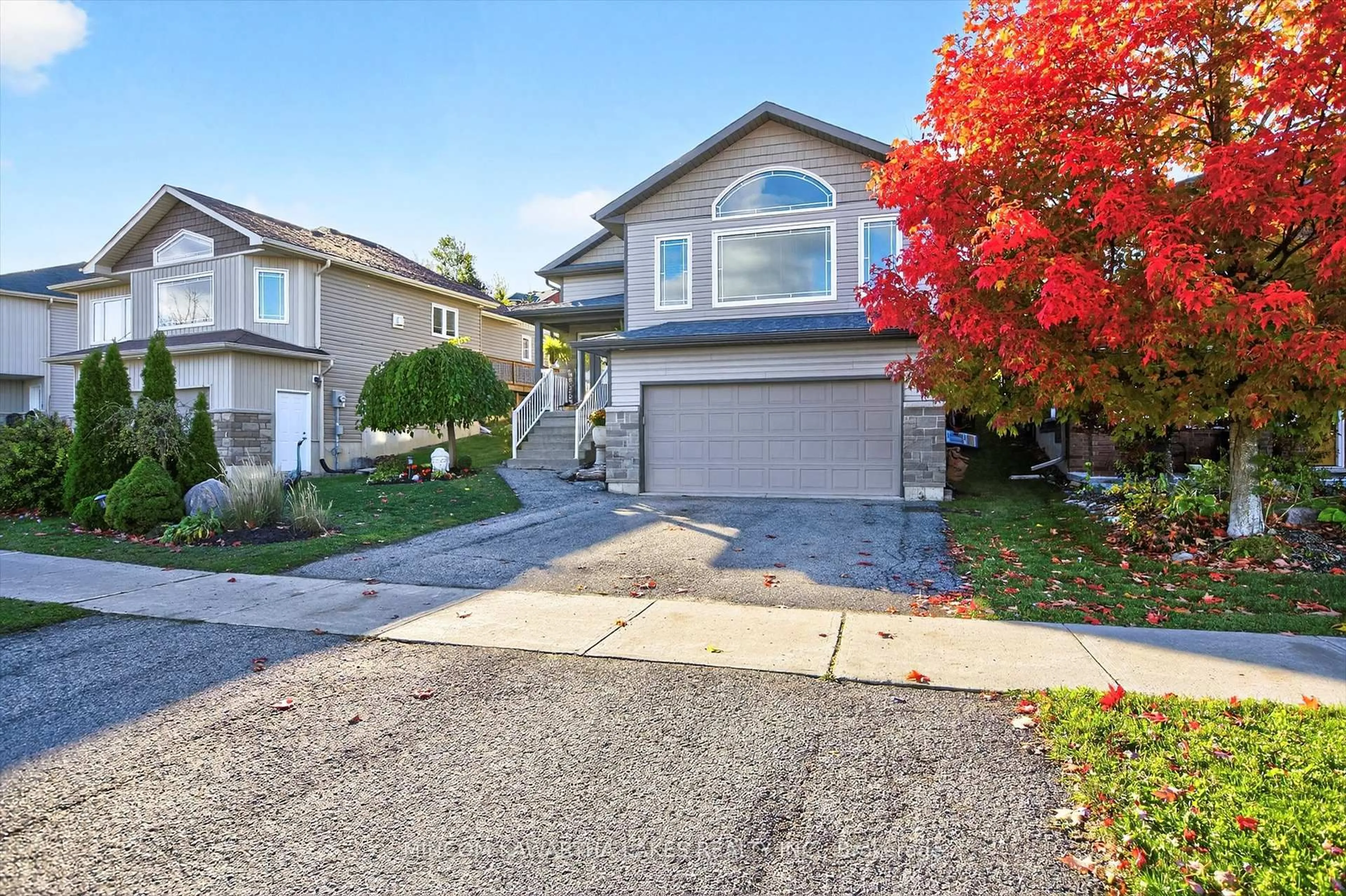 Home with vinyl exterior material, street for 127 Milroy Dr, Peterborough Ontario K9H 7T3